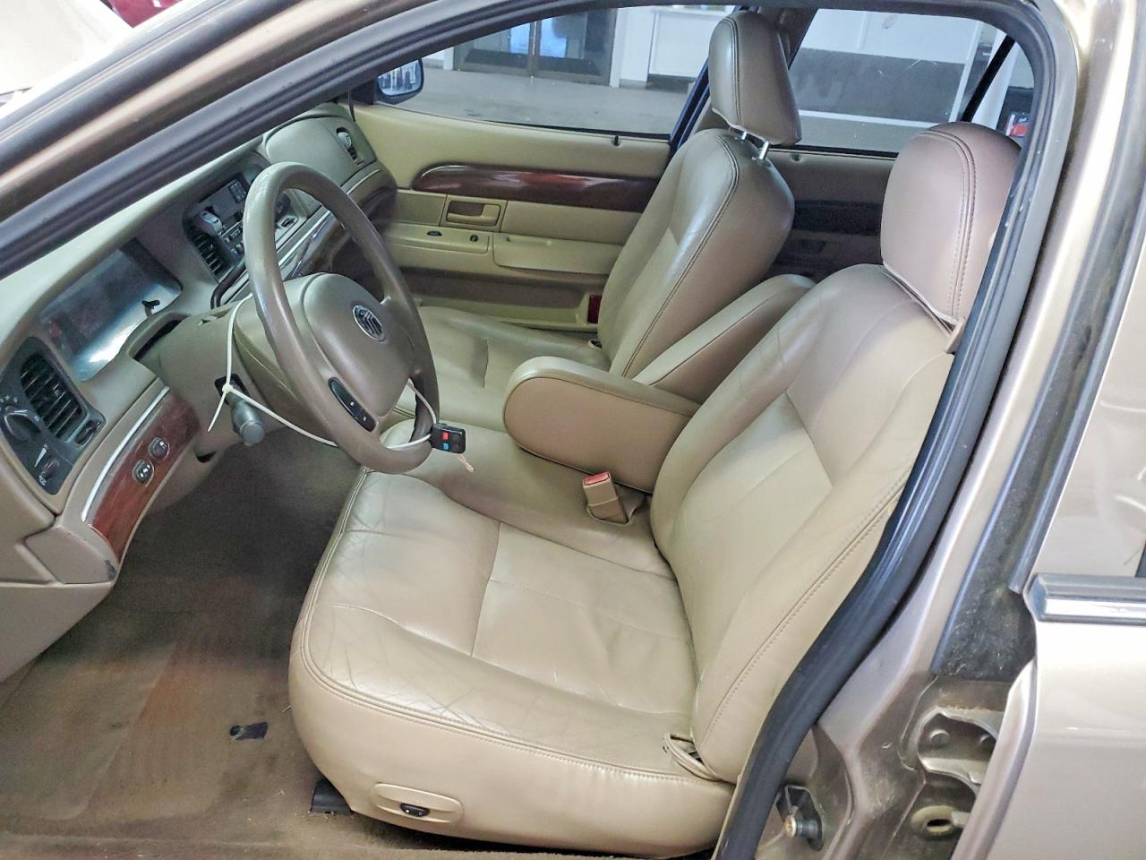 2003 Mercury Grand Marquis Gs Tan vin: 2MEFM74W63X703449