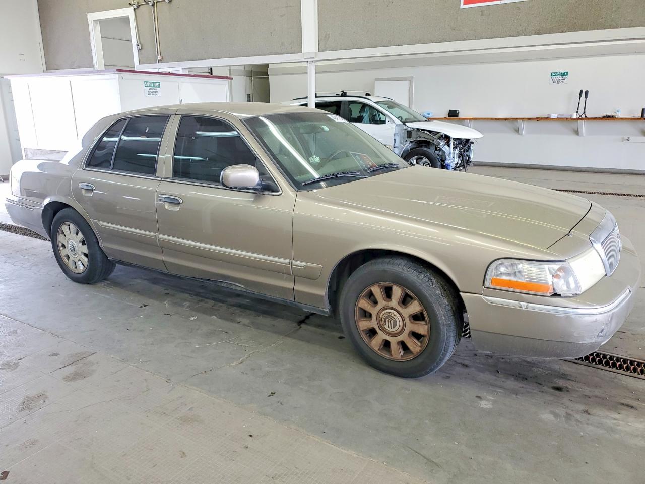 2003 Mercury Grand Marquis Gs Tan vin: 2MEFM74W63X703449
