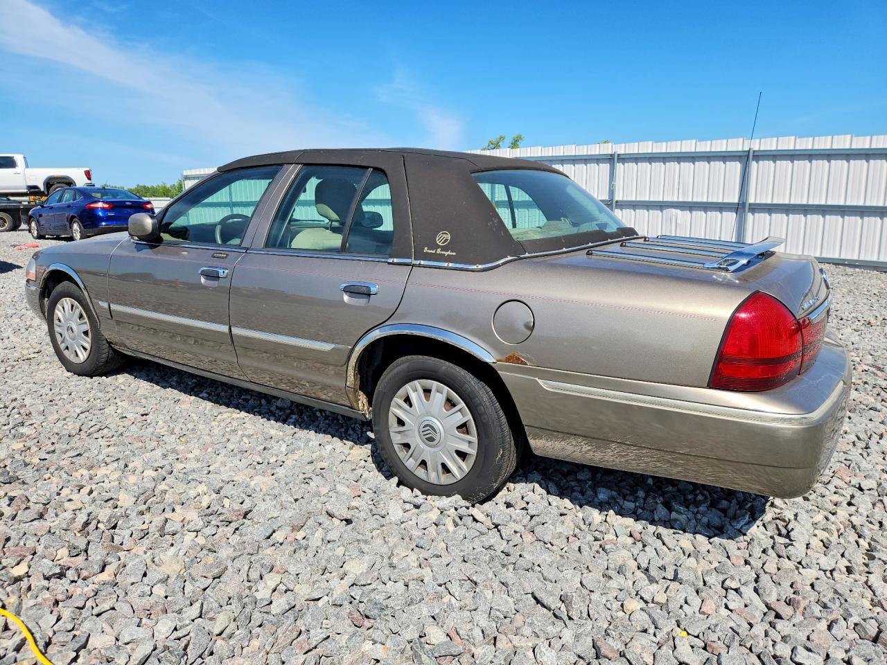 2005 Mercury Grand Marquis Gs Tan vin: 2MEFM74W65X623457