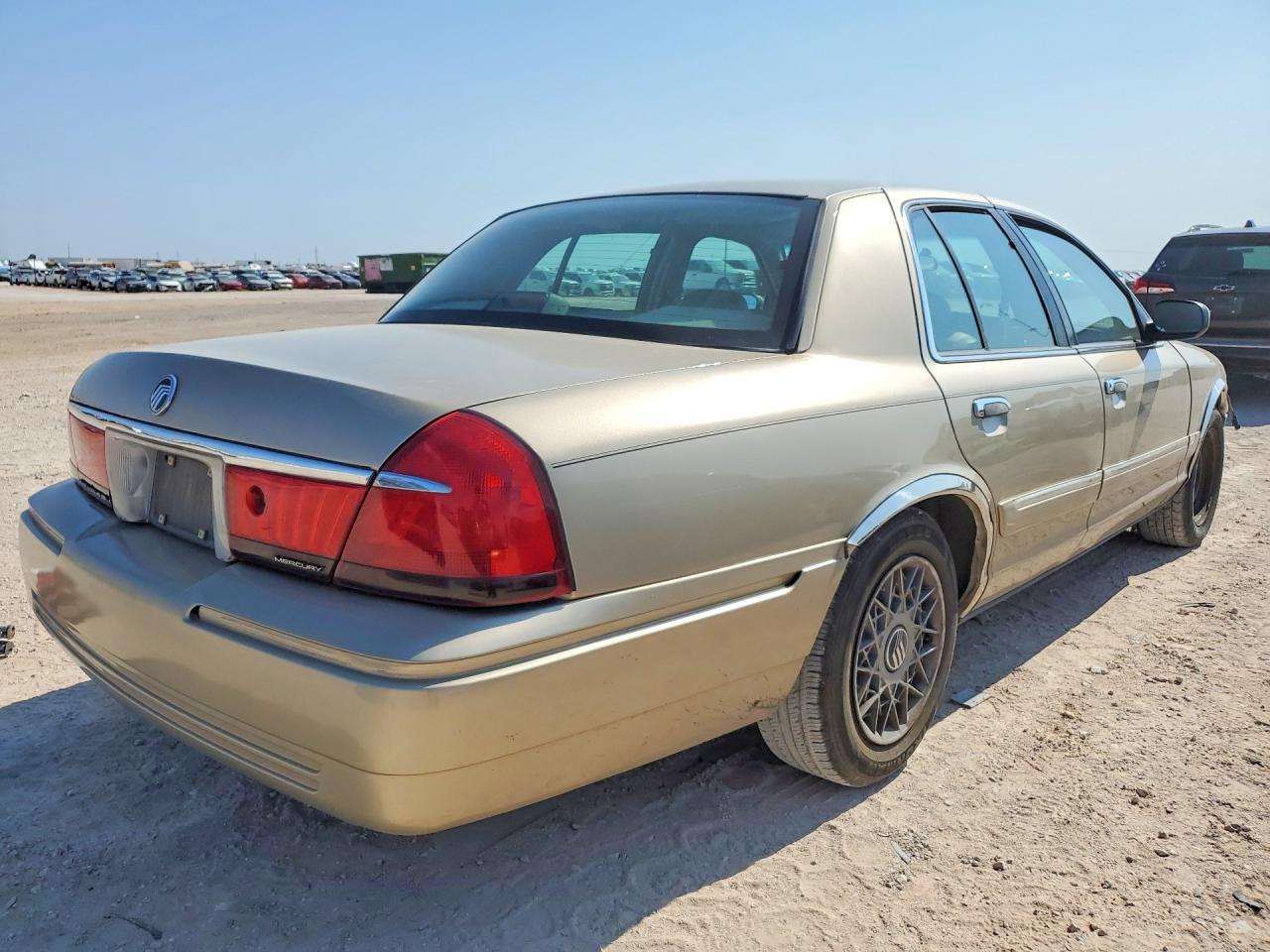 1999 Mercury Grand Marquis Gs Tan vin: 2MEFM74W6XX617967