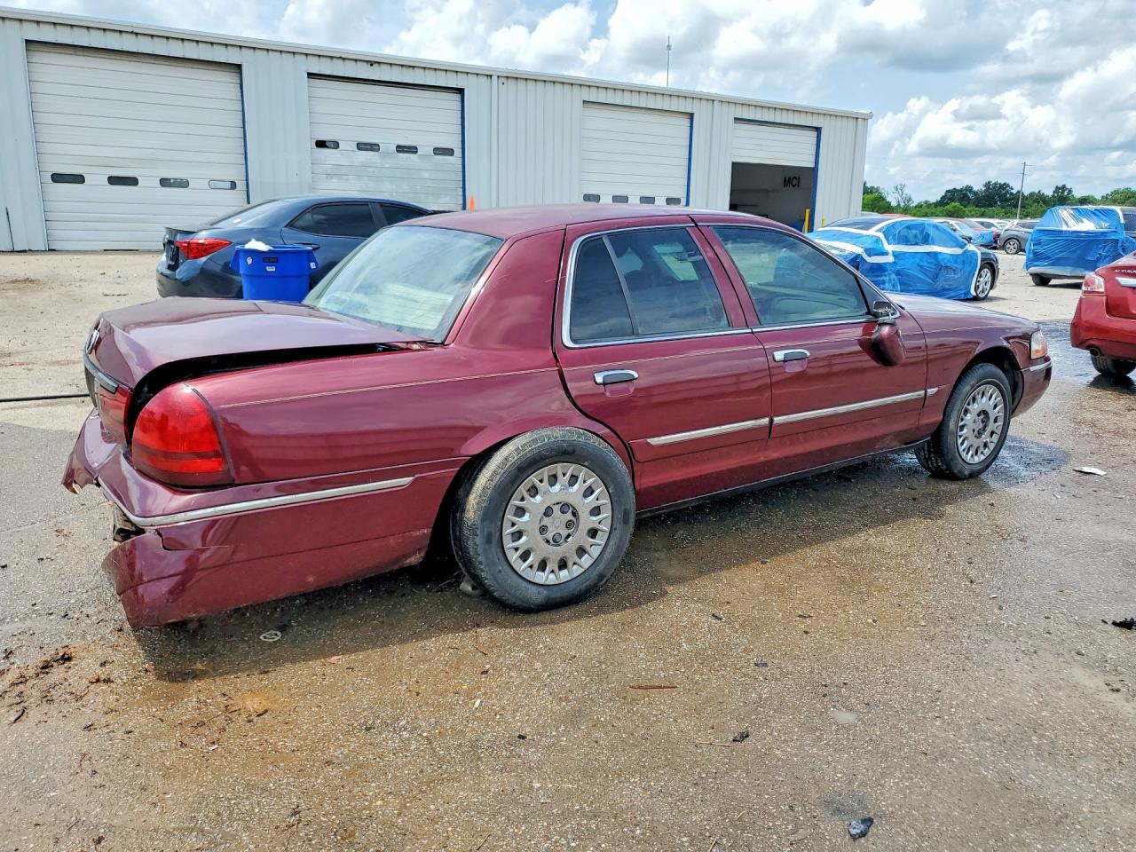 2004 Mercury Grand Marquis Gs Burgundy vin: 2MEFM74W74X604379