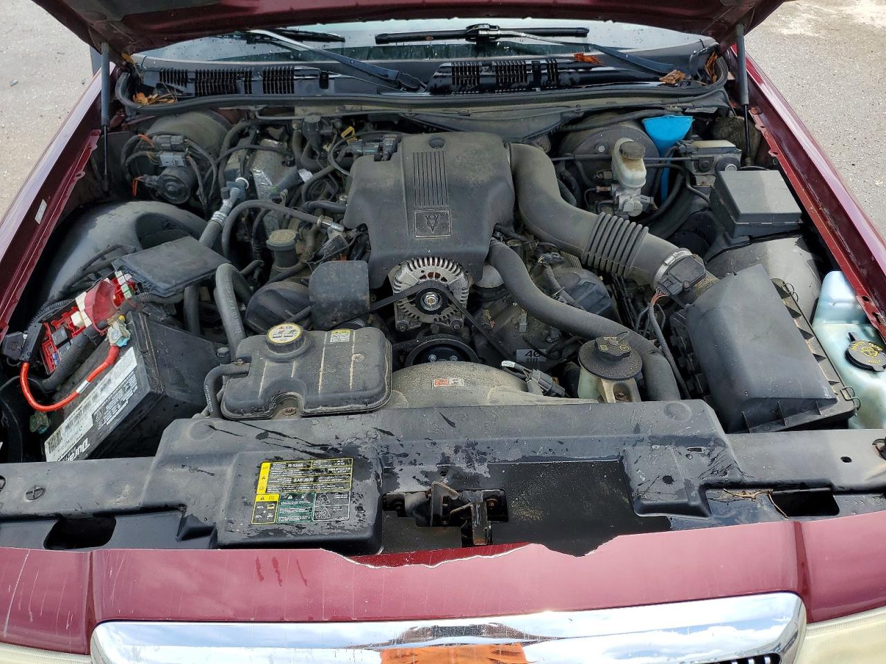 2004 Mercury Grand Marquis Gs Burgundy vin: 2MEFM74W74X604379
