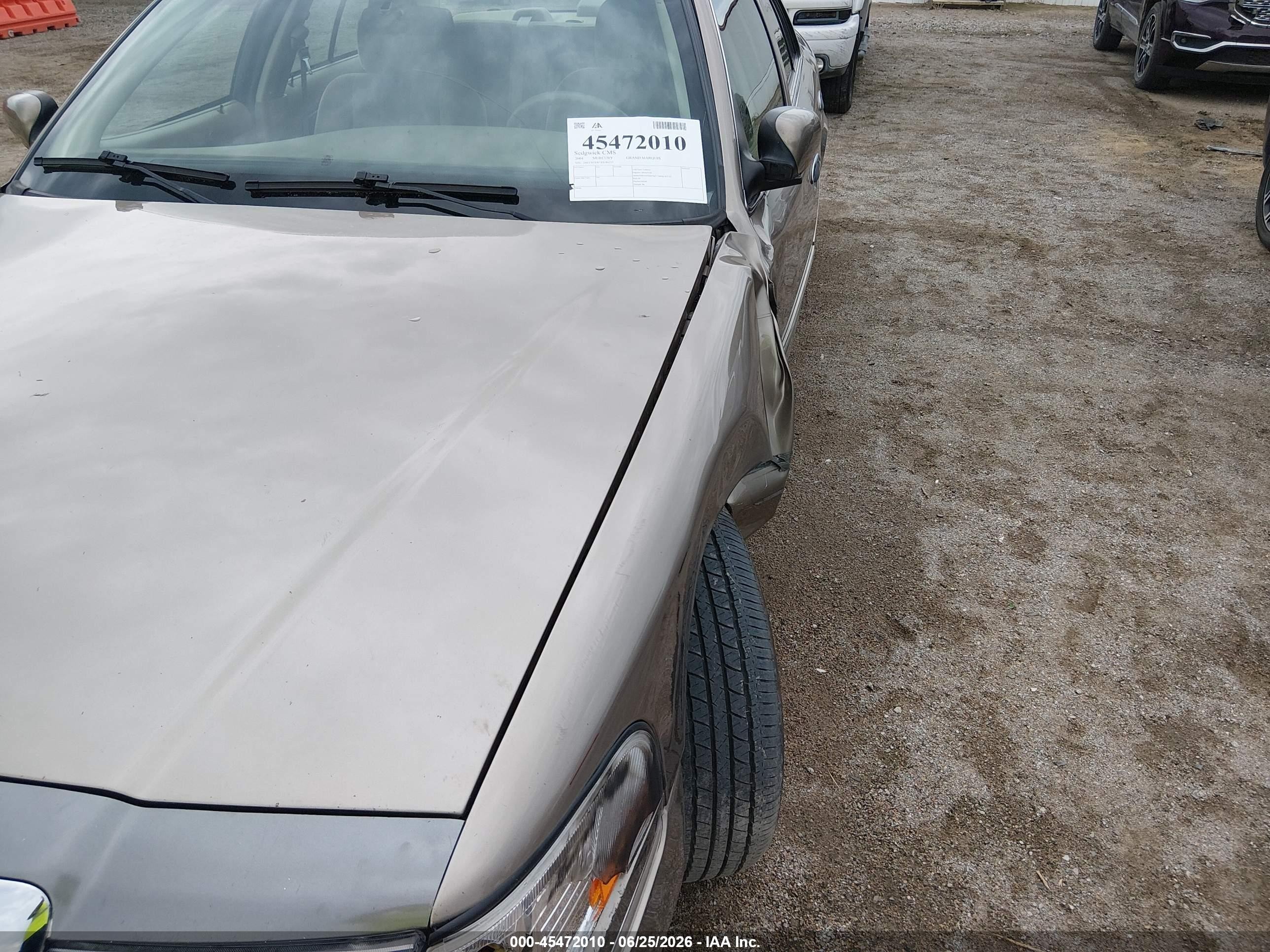 2004 Mercury Grand Marquis Gs Beige vin: 2MEFM74W74X684153