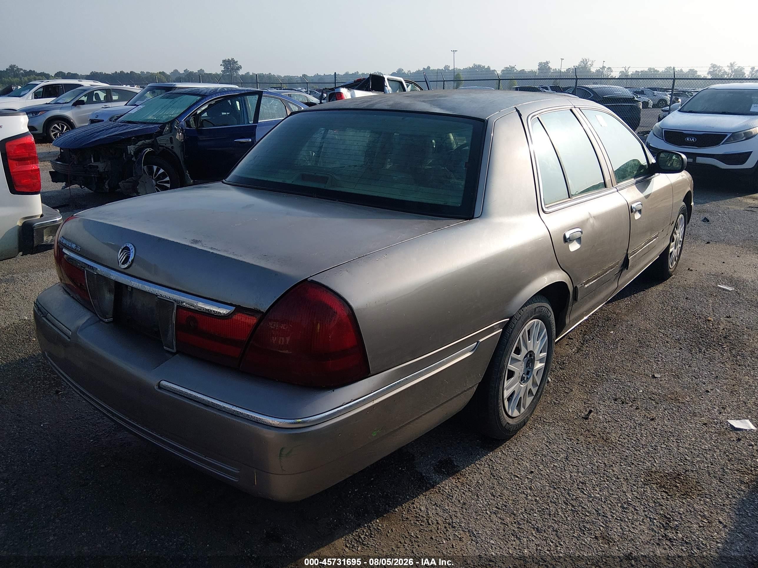 2004 Mercury Grand Marquis Gs Tan vin: 2MEFM74W74X696450