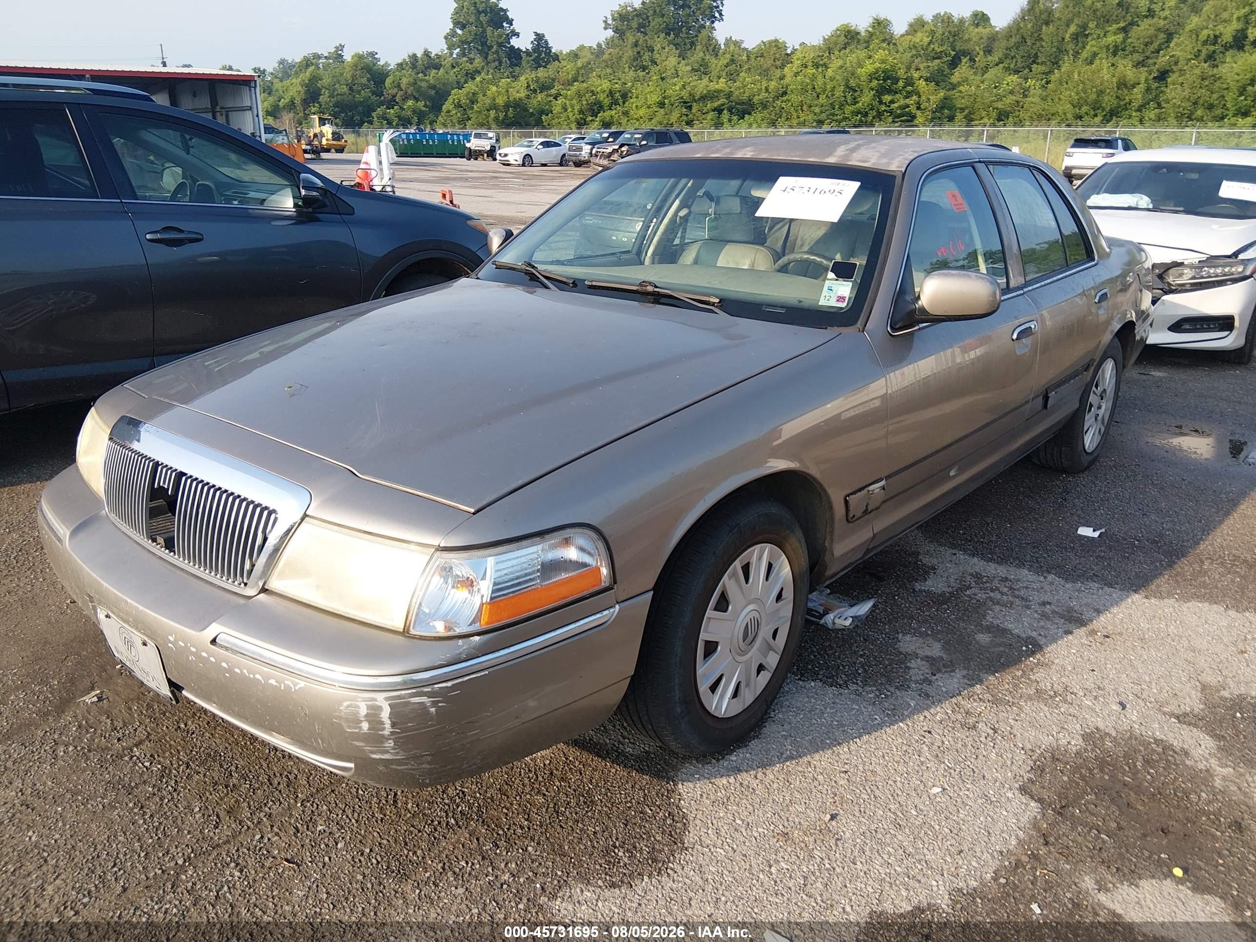 2004 Mercury Grand Marquis Gs Tan vin: 2MEFM74W74X696450