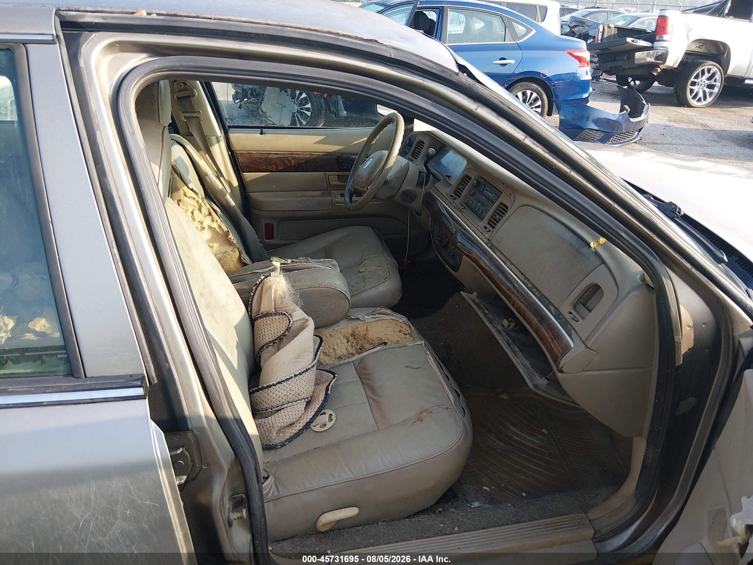 2004 Mercury Grand Marquis Gs Tan vin: 2MEFM74W74X696450