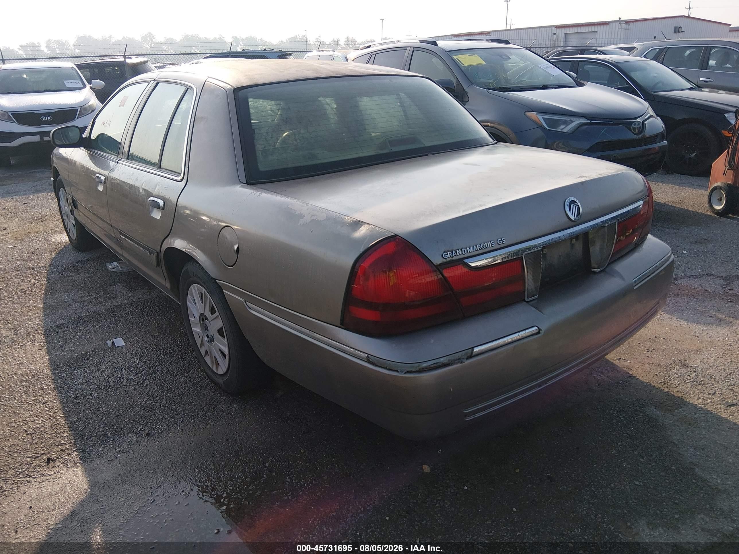 2004 Mercury Grand Marquis Gs Tan vin: 2MEFM74W74X696450