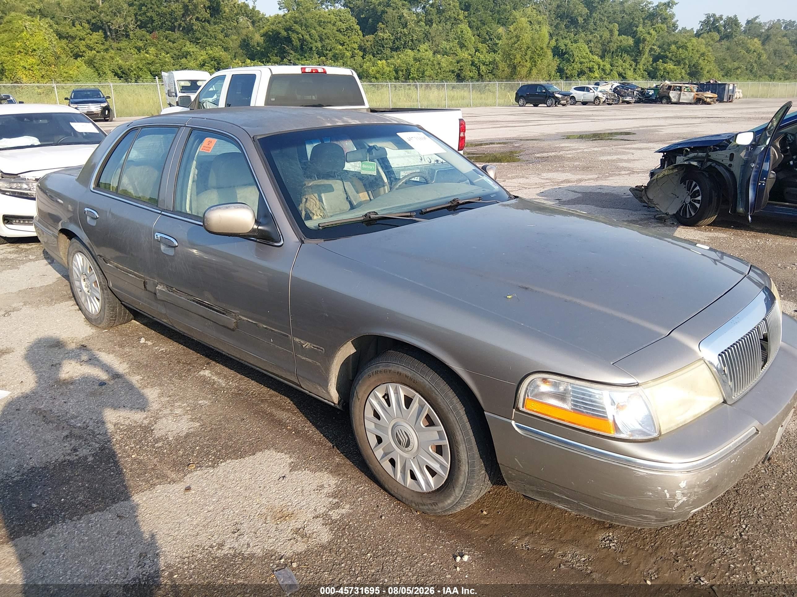 2004 Mercury Grand Marquis Gs Tan vin: 2MEFM74W74X696450