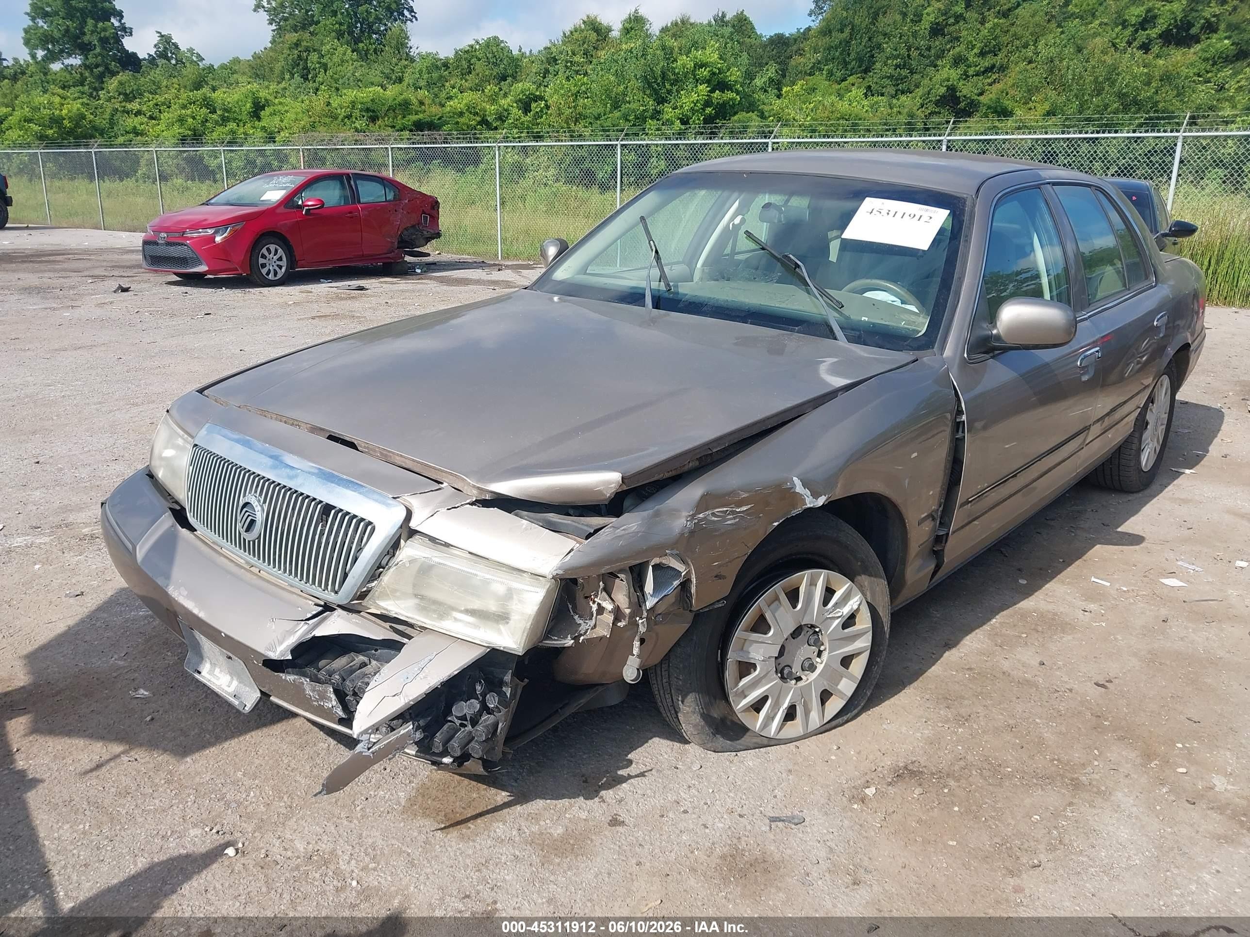 2005 Mercury Grand Marquis Gs Brown vin: 2MEFM74W75X667063