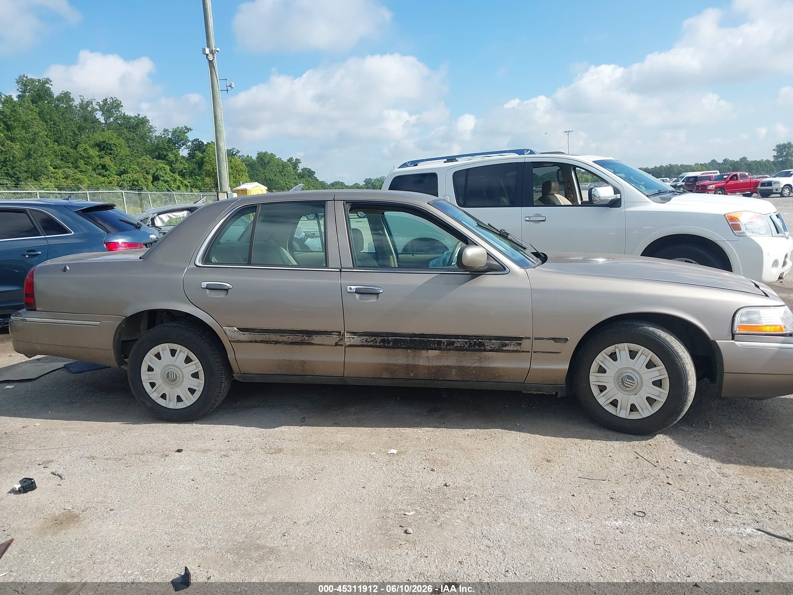 2005 Mercury Grand Marquis Gs Brown vin: 2MEFM74W75X667063