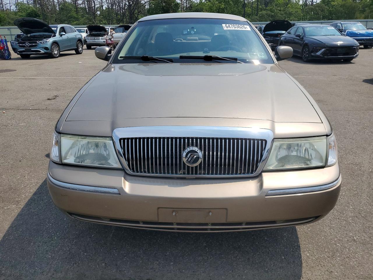 2005 Mercury Grand Marquis Tan vin: 2MEFM74W75X674868