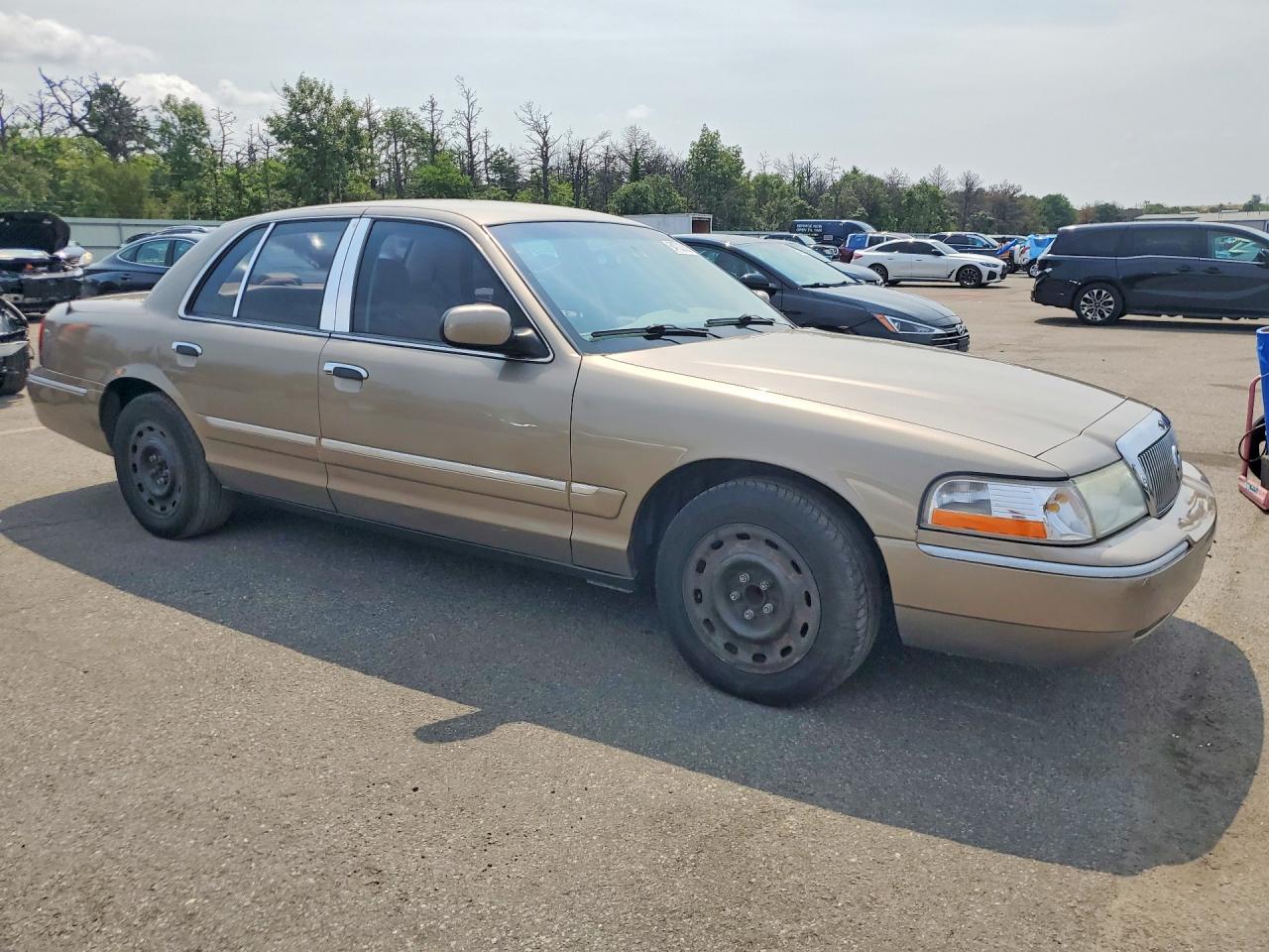 2005 Mercury Grand Marquis Tan vin: 2MEFM74W75X674868