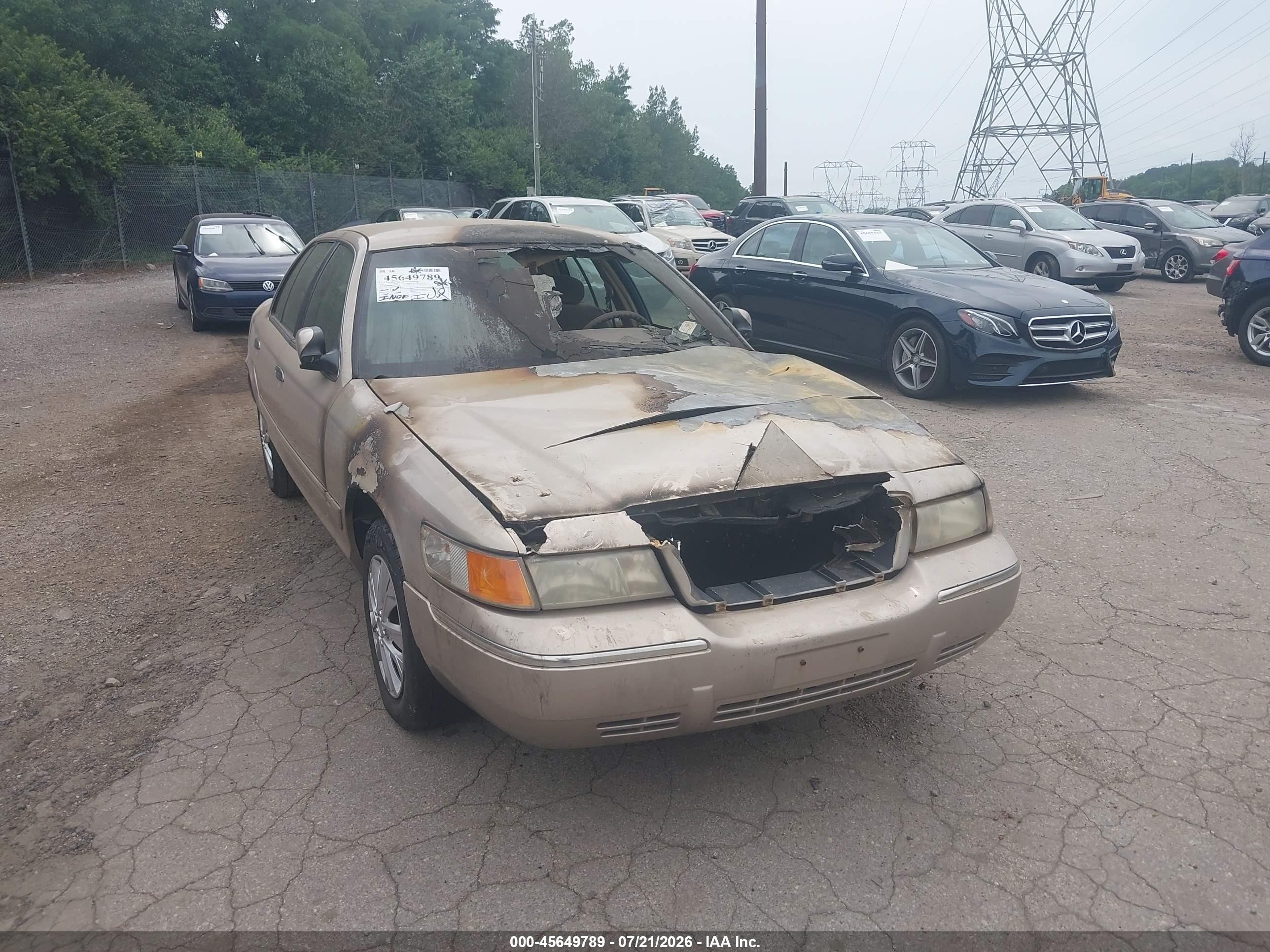 1998 Mercury Grand Marquis   Gold vin: 2MEFM74W7WX692661