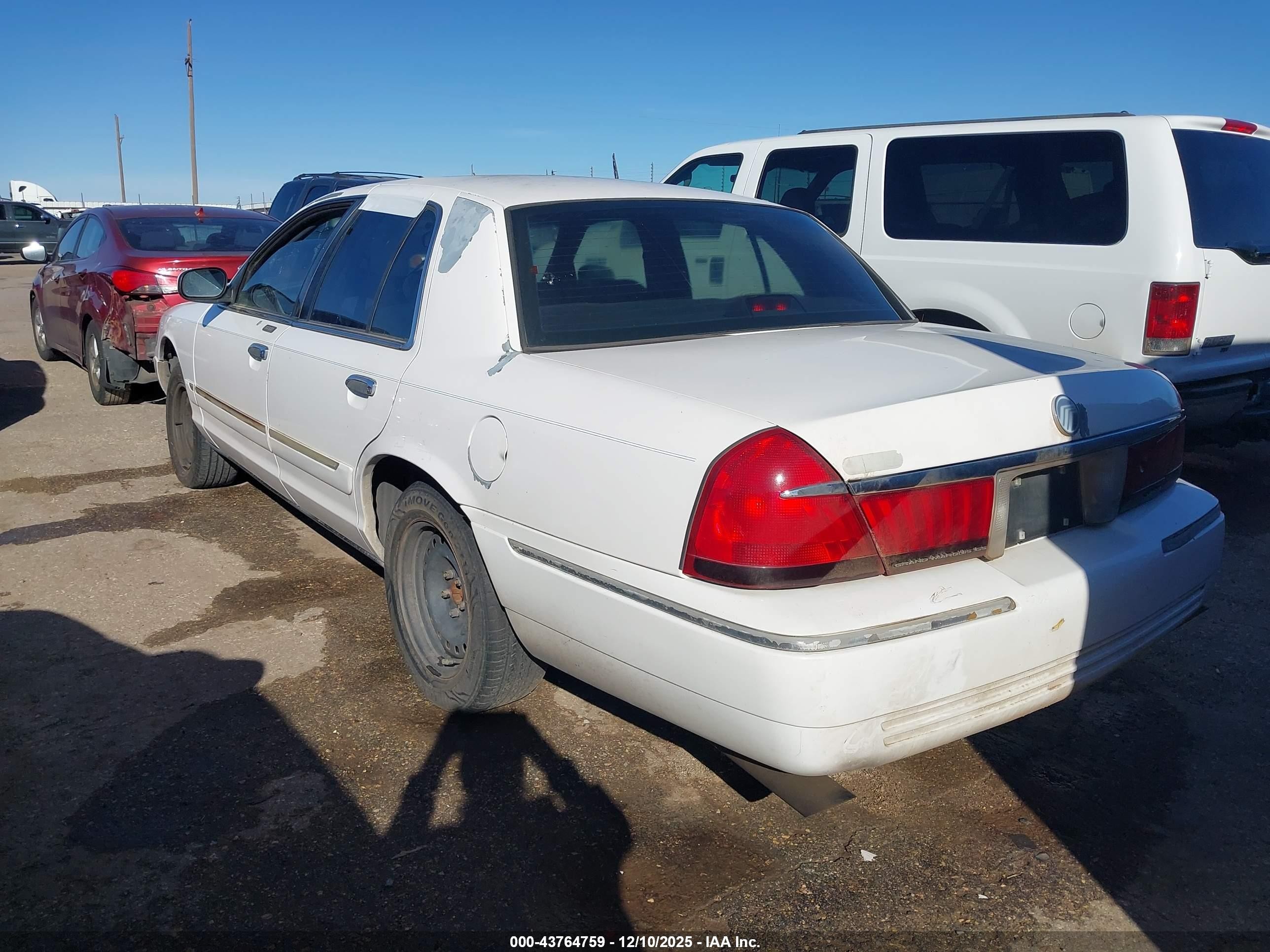 1998 Mercury Grand Marquis   White vin: 2MEFM74W8WX601638