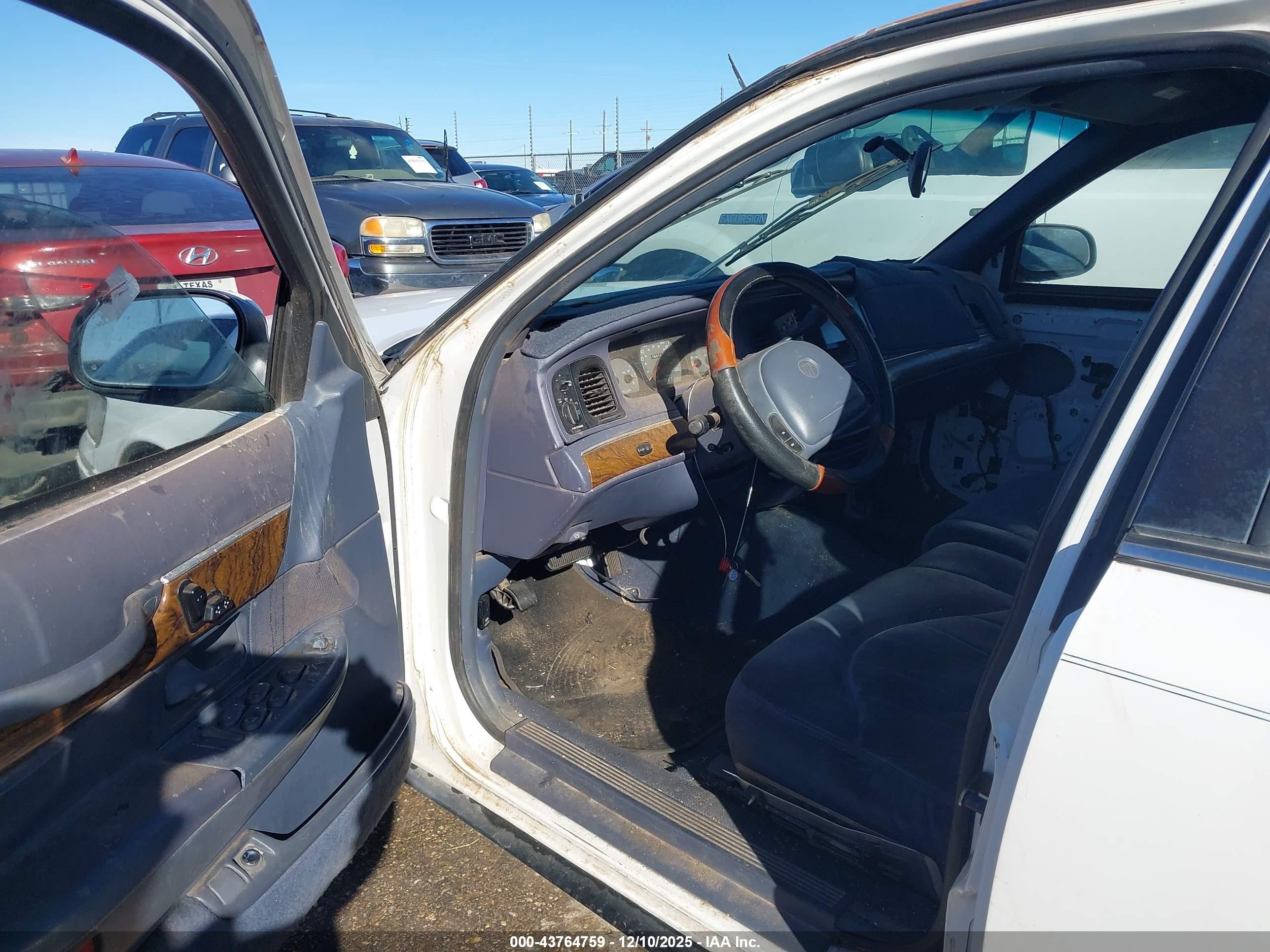 1998 Mercury Grand Marquis   White vin: 2MEFM74W8WX601638