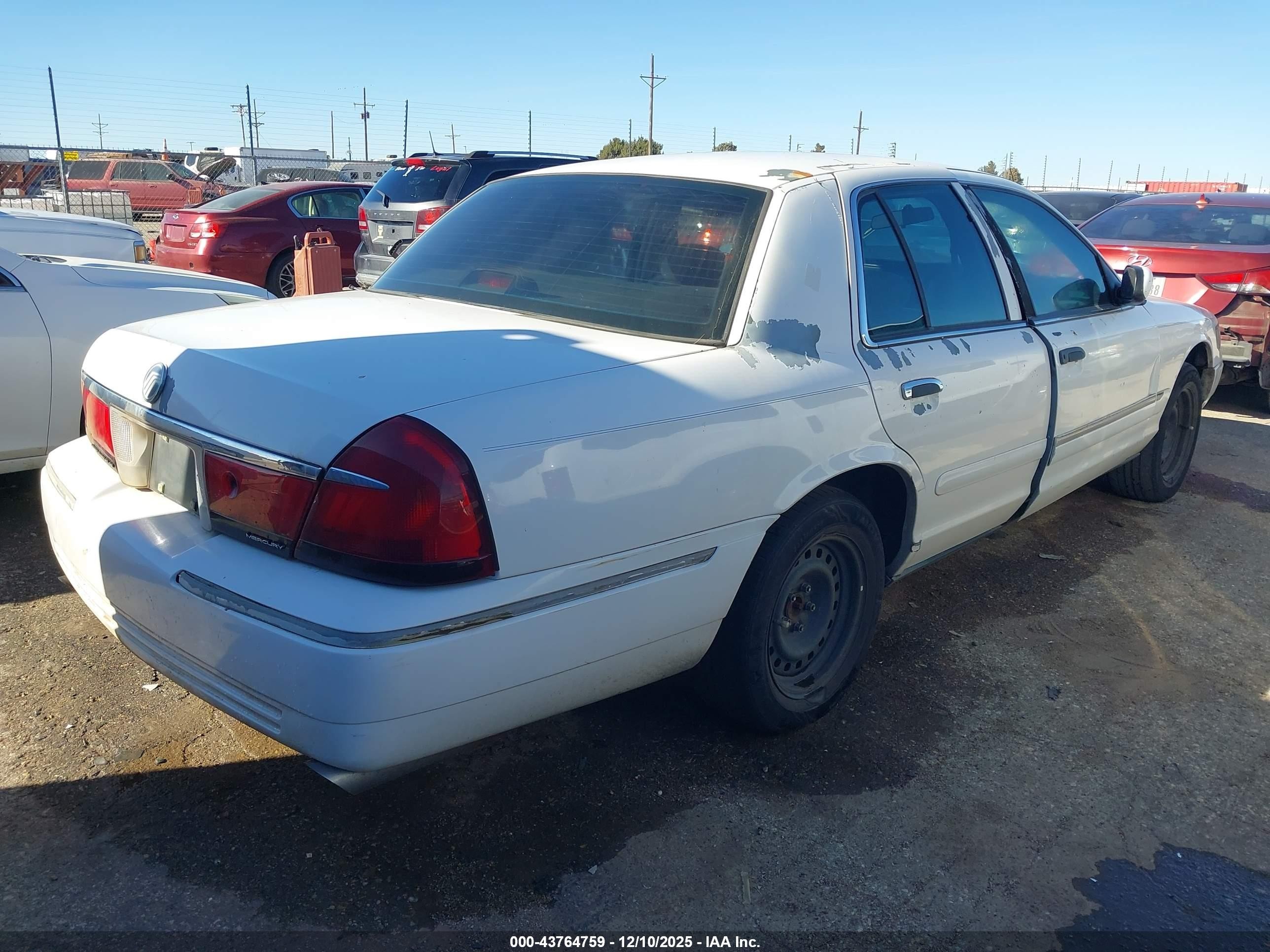 1998 Mercury Grand Marquis   White vin: 2MEFM74W8WX601638