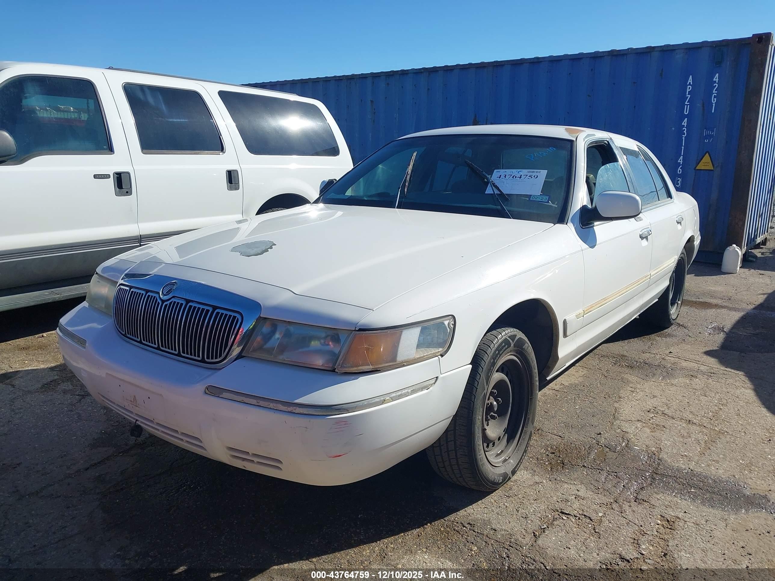1998 Mercury Grand Marquis   White vin: 2MEFM74W8WX601638