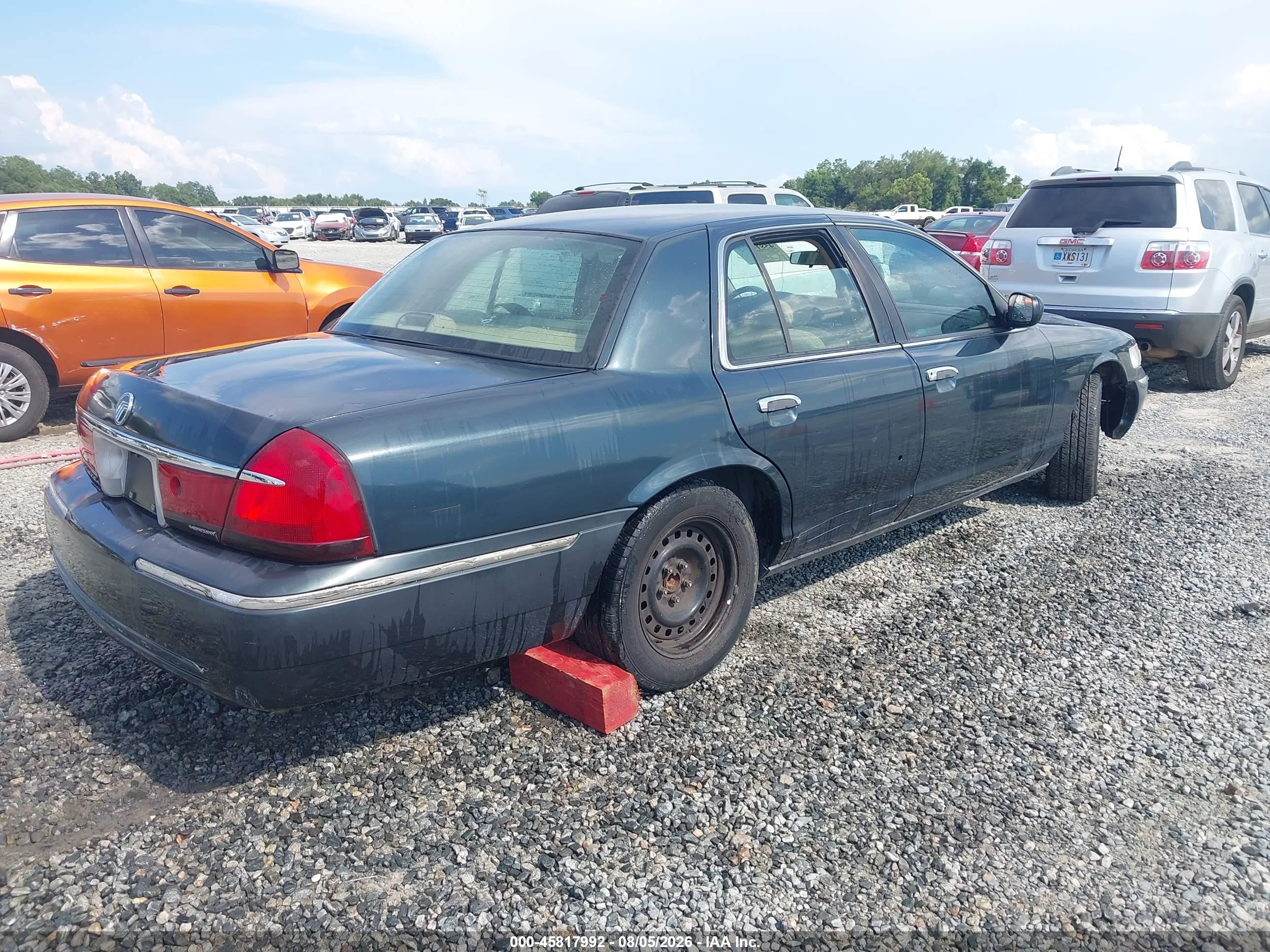 1998 Mercury Grand Marquis   Dark Blue vin: 2MEFM74W8WX622022