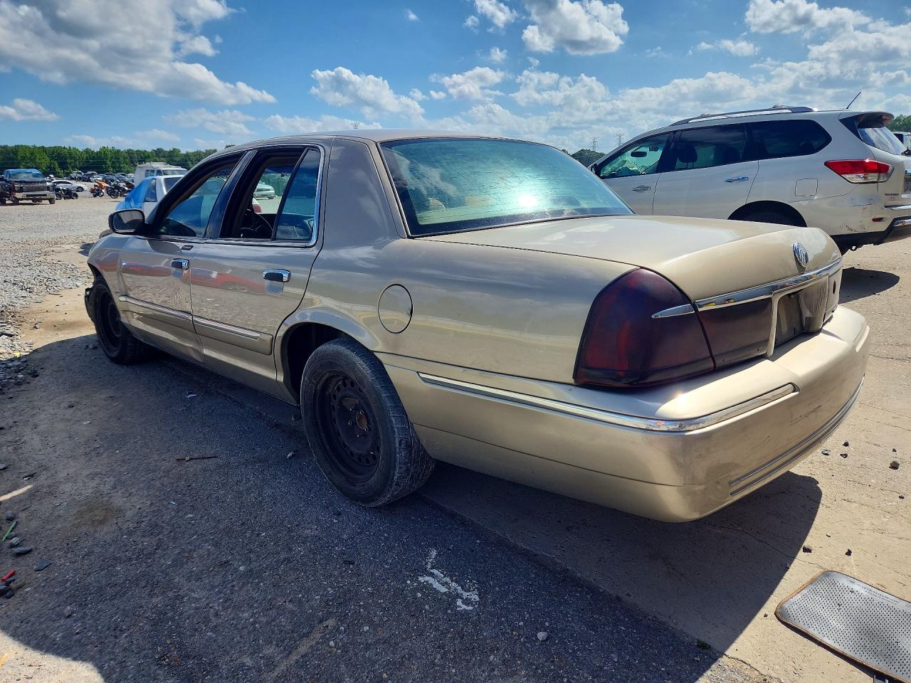 1999 Mercury Grand Marquis Gs Желто-коричневый vin: 2MEFM74W8XX696817