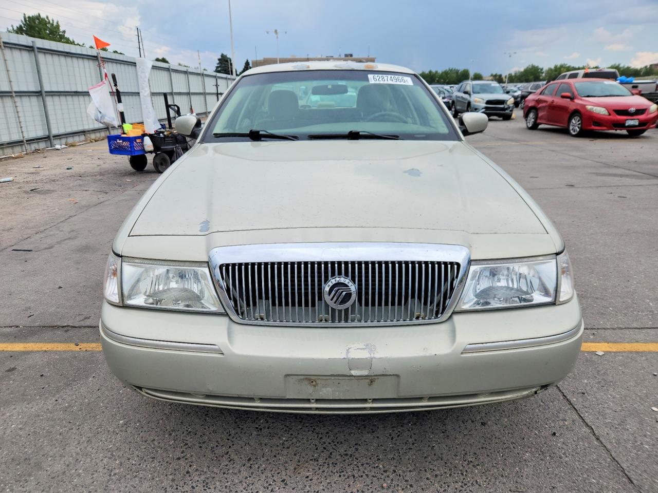 2005 Mercury Grand Marquis Gs Tan vin: 2MEFM74W95X610945