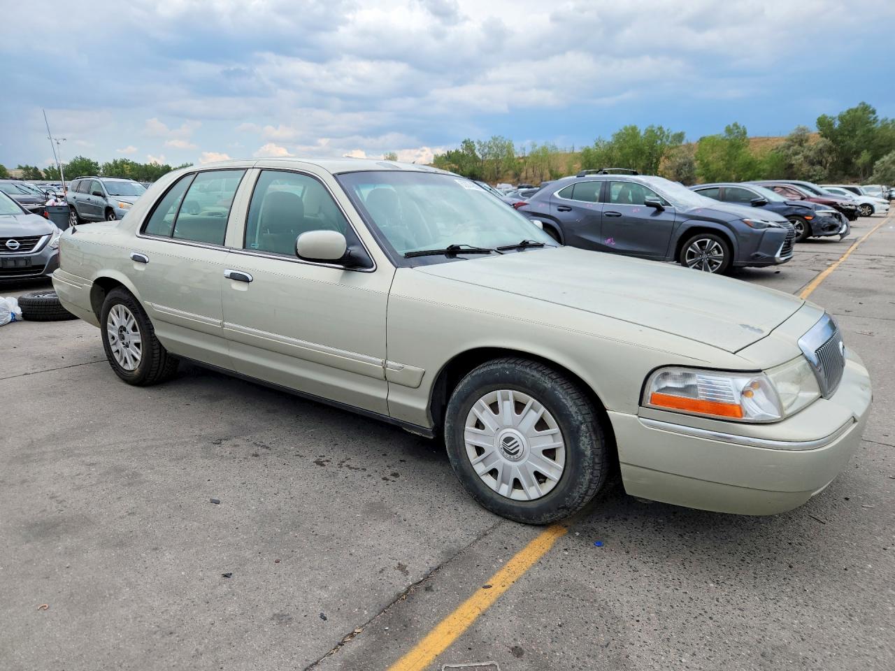 2005 Mercury Grand Marquis Gs Tan vin: 2MEFM74W95X610945