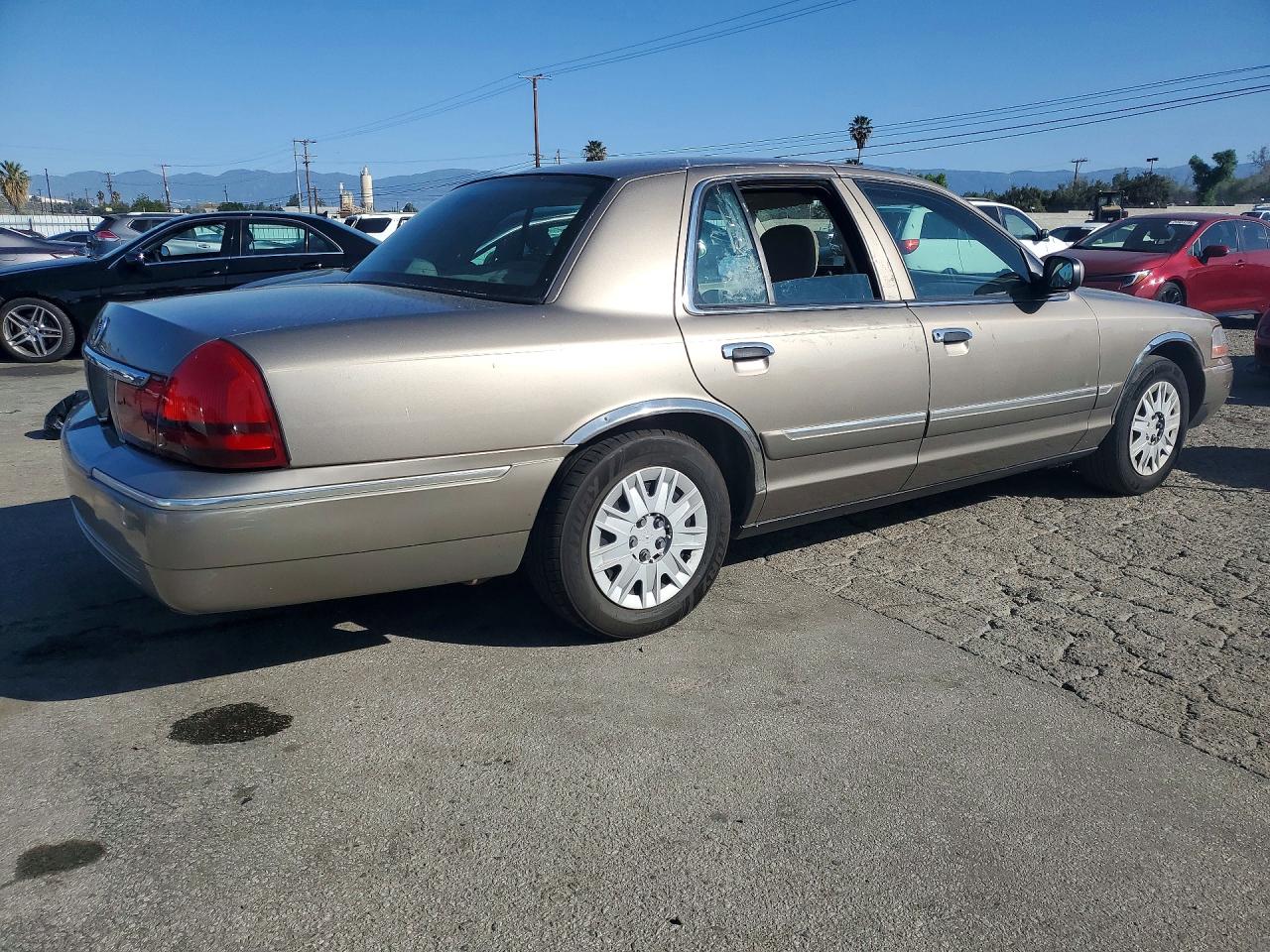 2004 Mercury Grand Marquis Gs Золотой vin: 2MEFM74WX4X662549