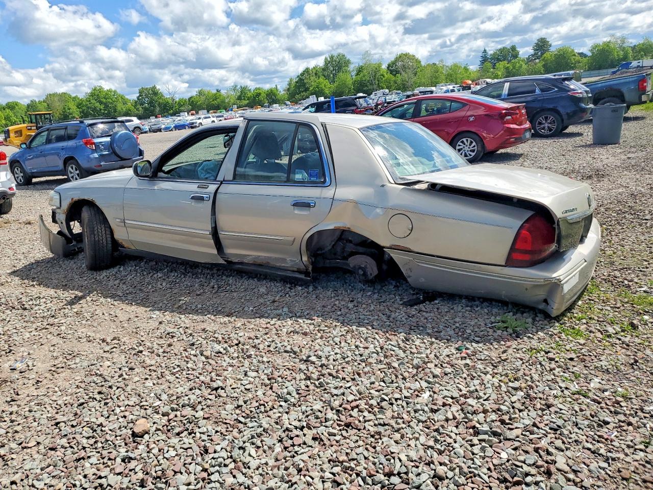 2006 Mercury Grand Marquis Ls Gold vin: 2MEFM75V16X606086