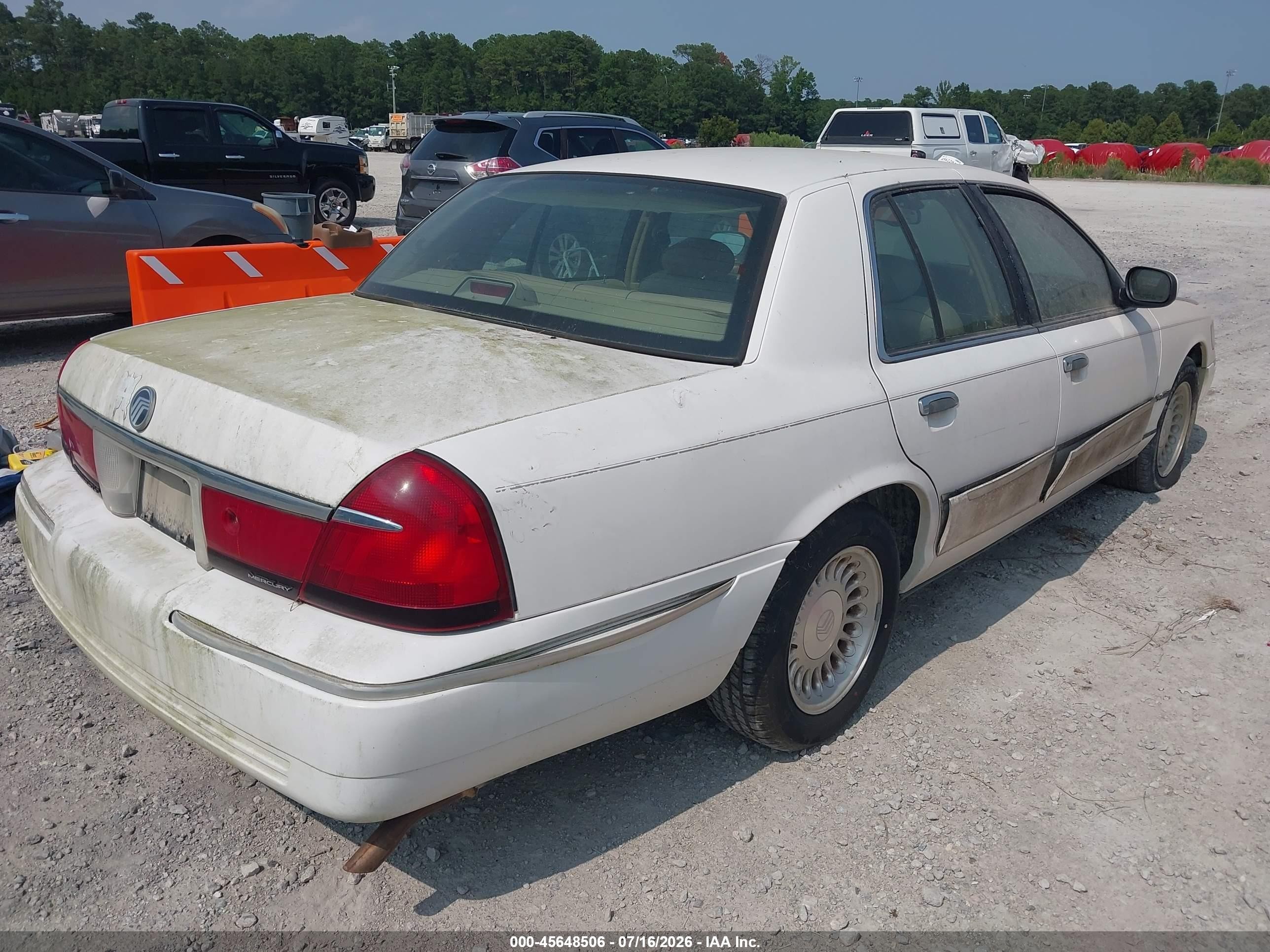 1998 Mercury Grand Marquis   White vin: 2MEFM75W0WX601003