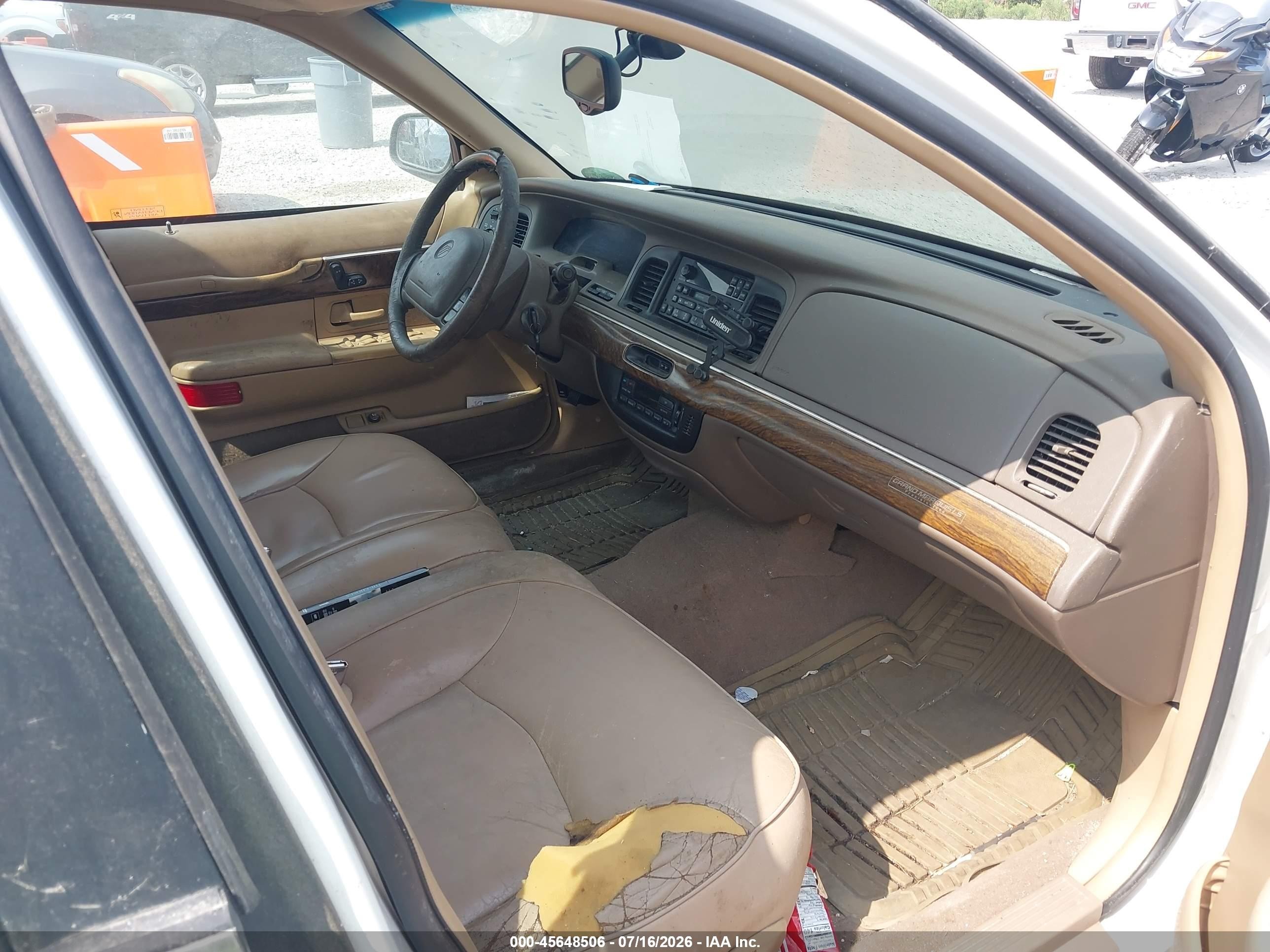 1998 Mercury Grand Marquis   White vin: 2MEFM75W0WX601003