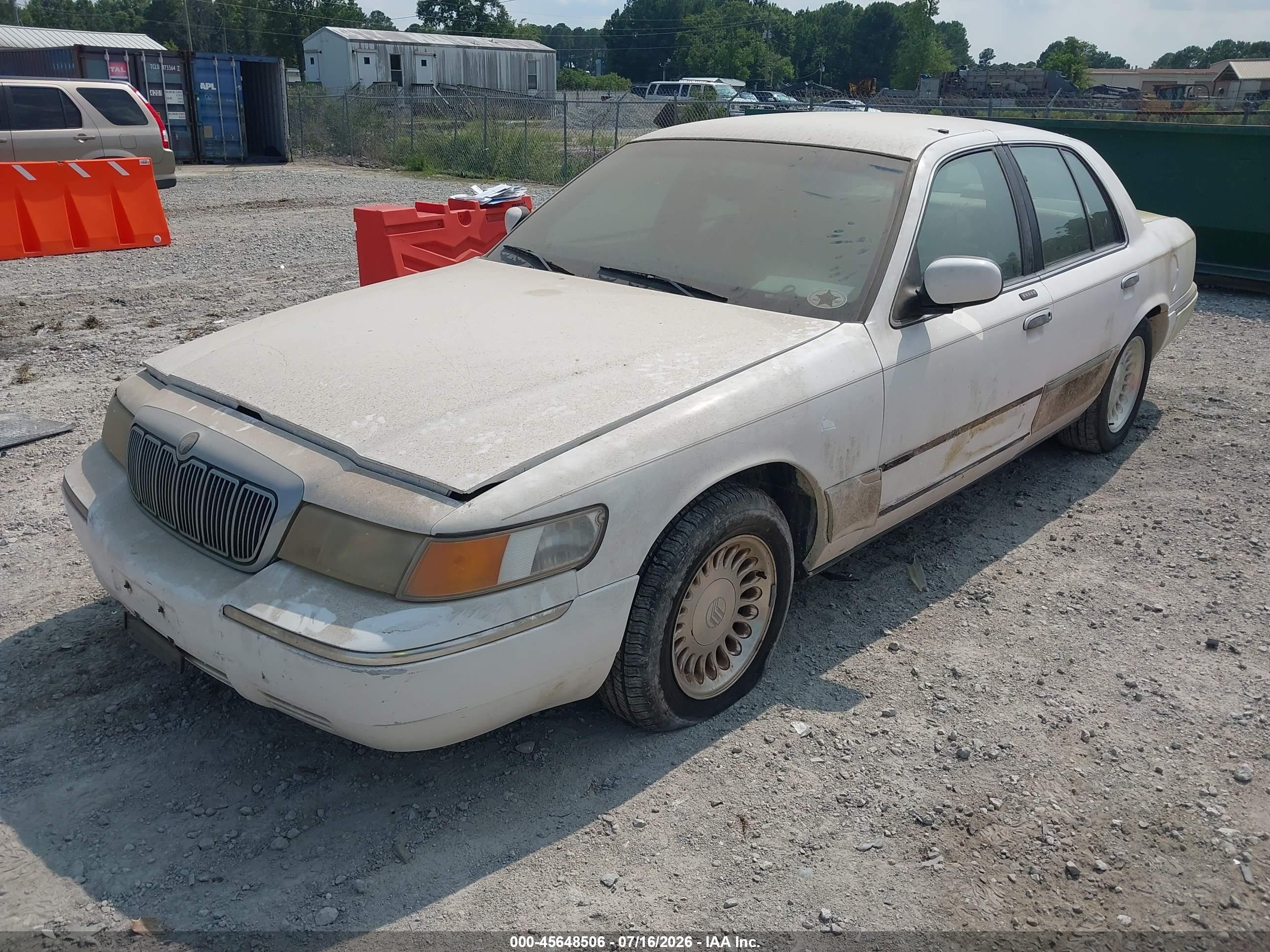 1998 Mercury Grand Marquis   White vin: 2MEFM75W0WX601003