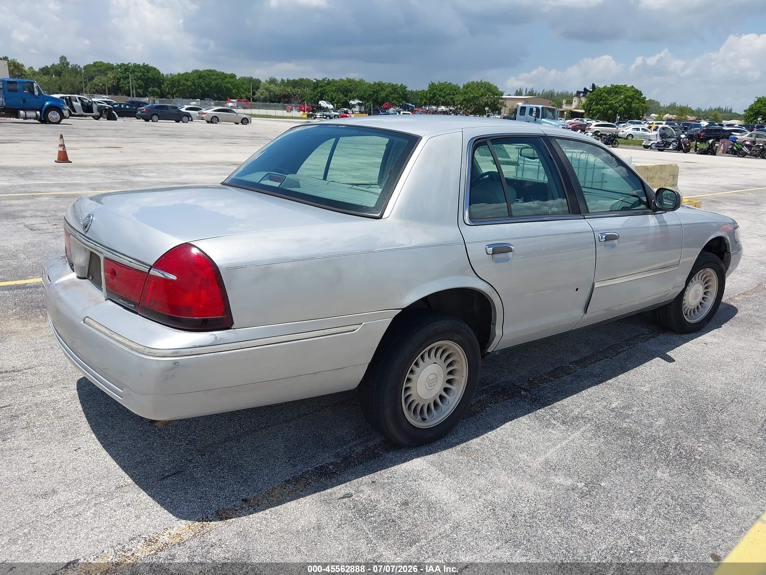 1998 Mercury Grand Marquis   Silver vin: 2MEFM75W0WX663307