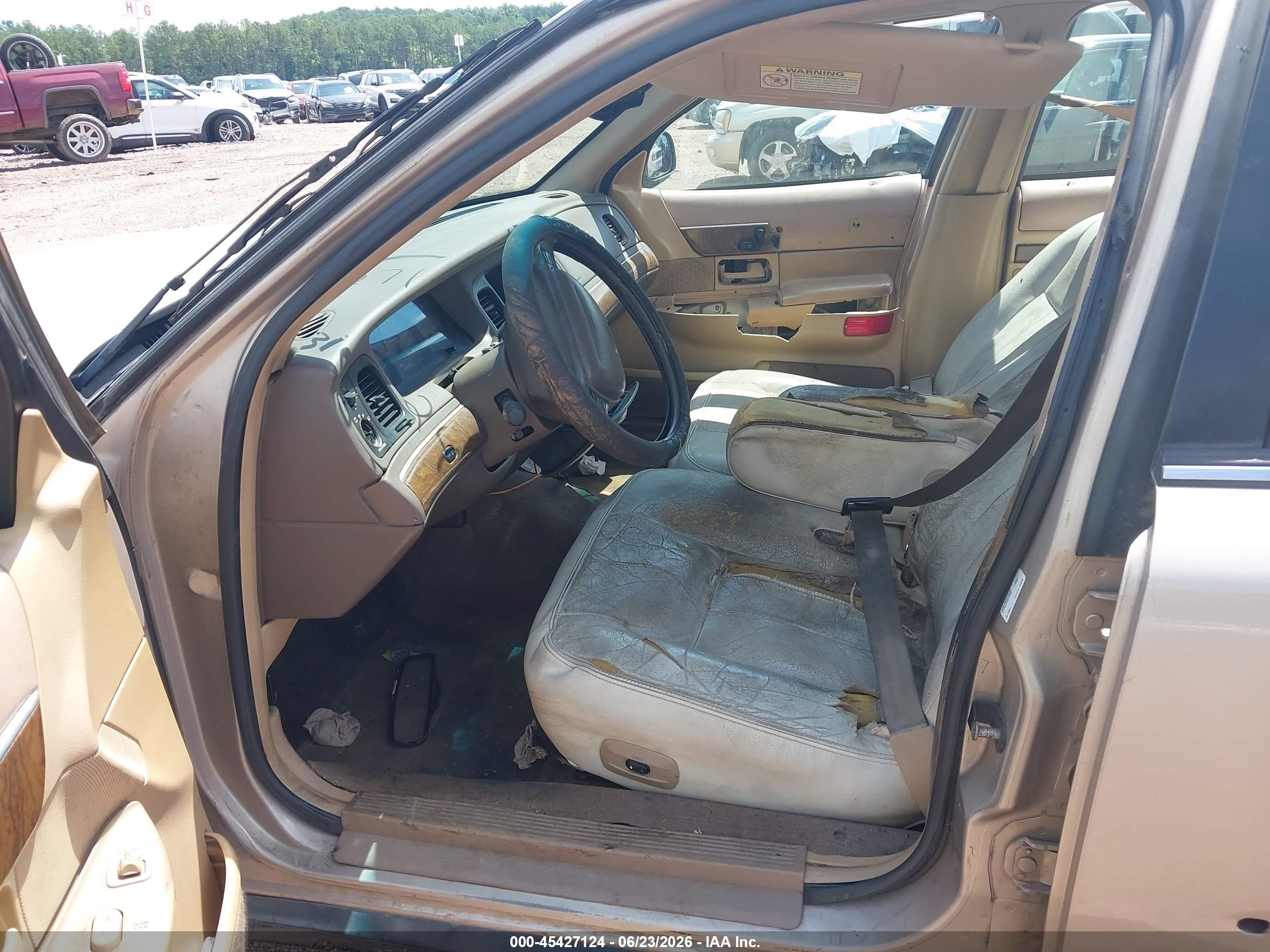 1998 Mercury Grand Marquis   Silver vin: 2MEFM75W1WX631031
