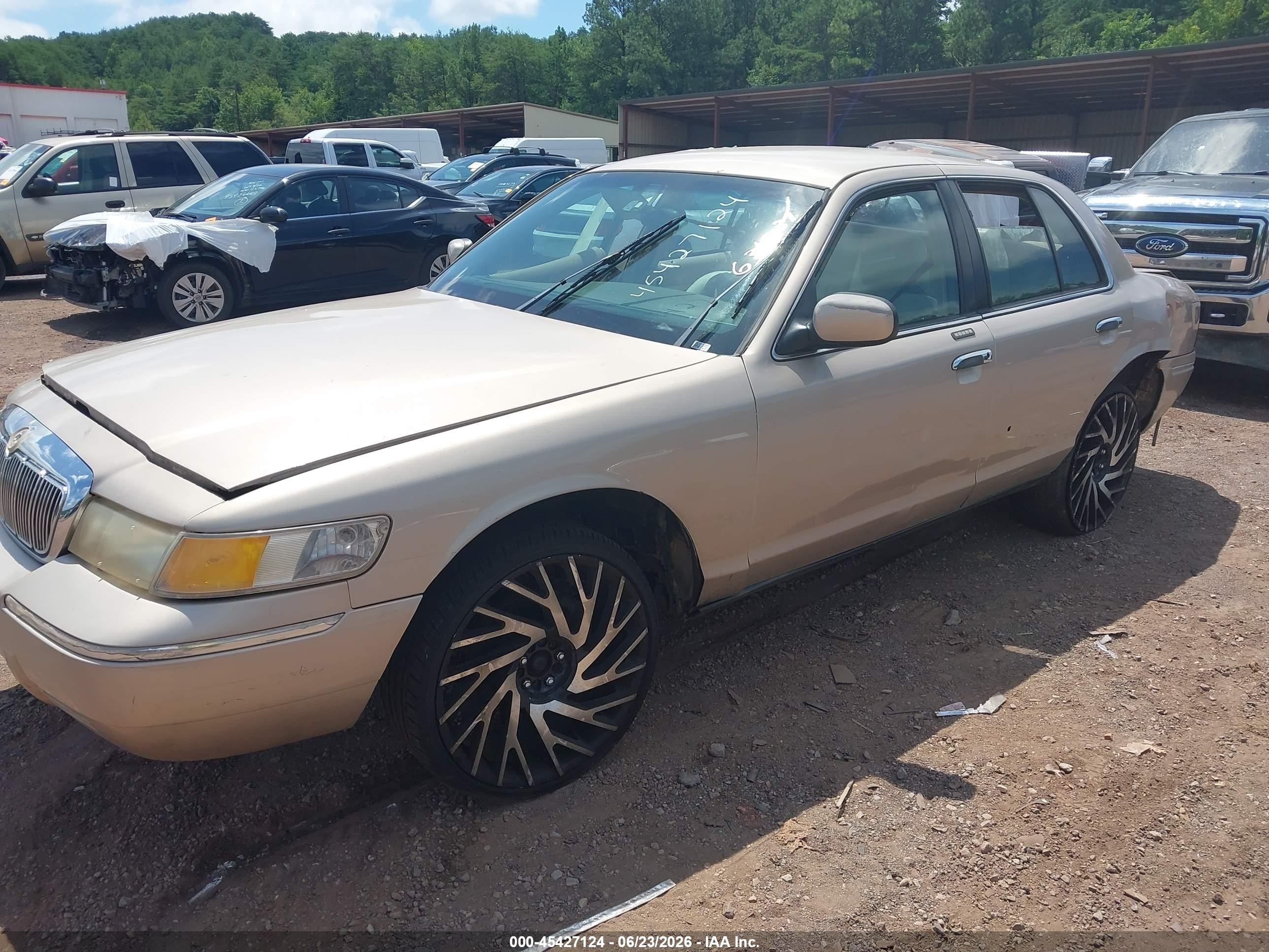 1998 Mercury Grand Marquis   Silver vin: 2MEFM75W1WX631031
