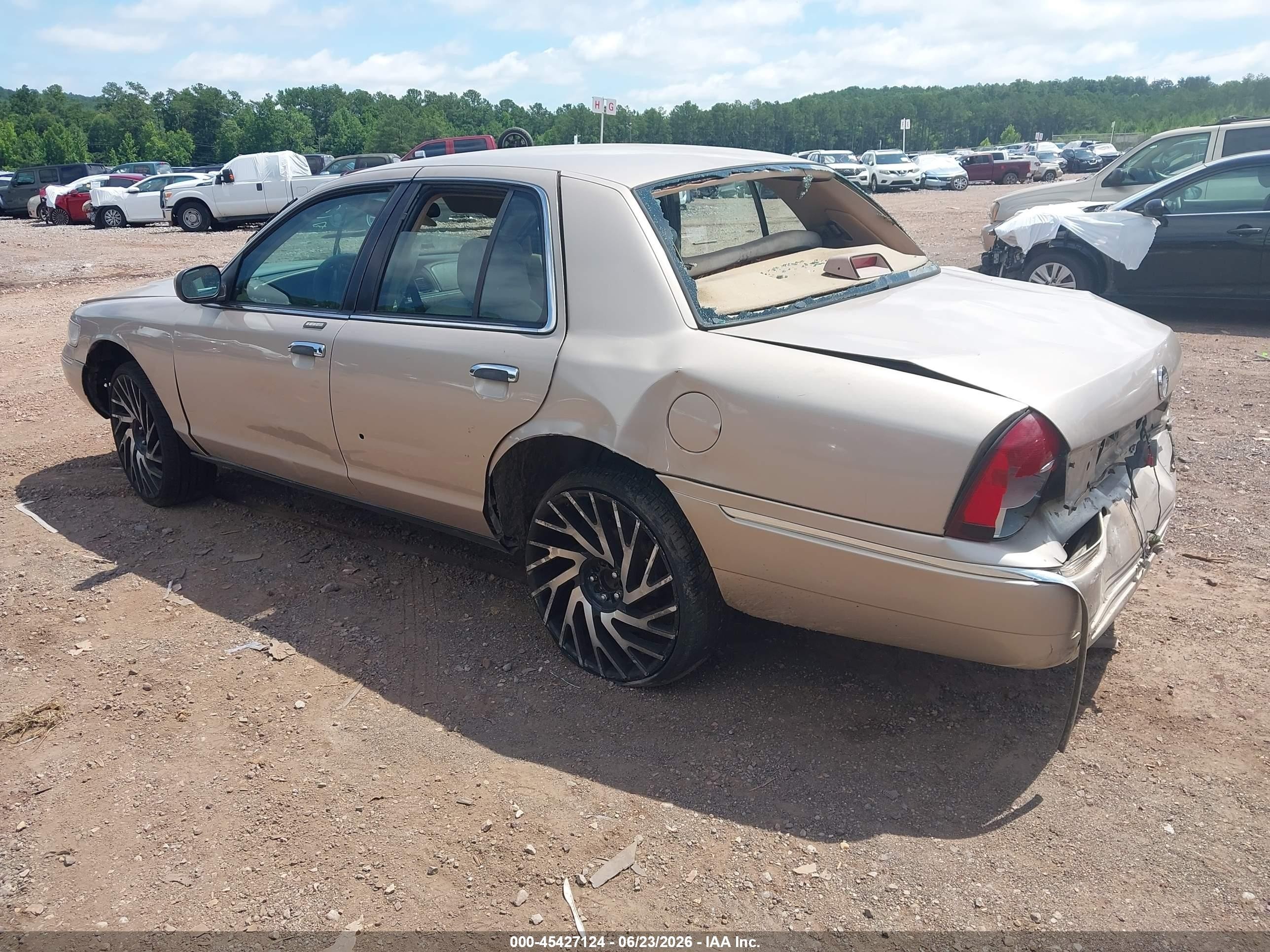 1998 Mercury Grand Marquis   Silver vin: 2MEFM75W1WX631031