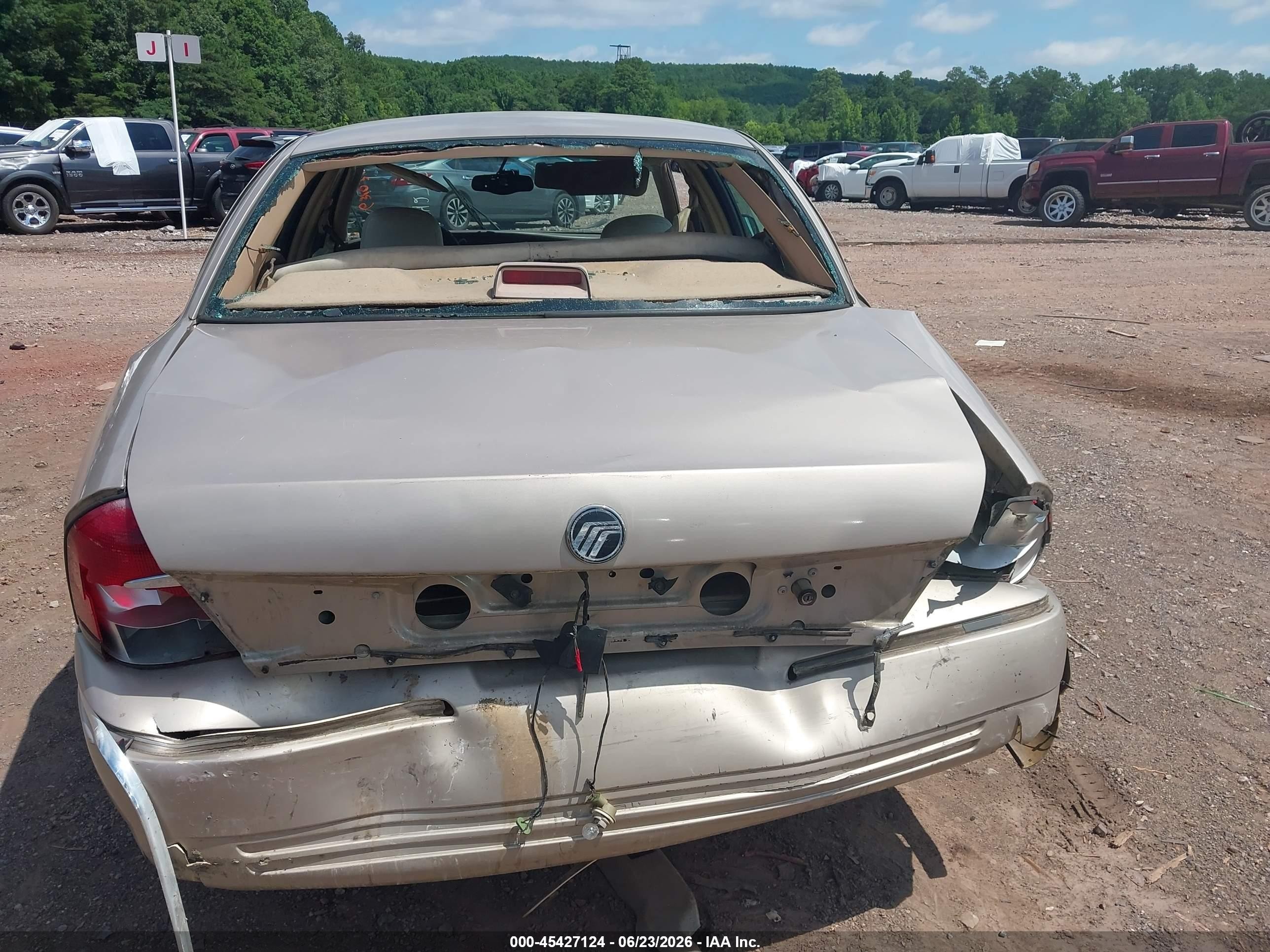 1998 Mercury Grand Marquis   Silver vin: 2MEFM75W1WX631031