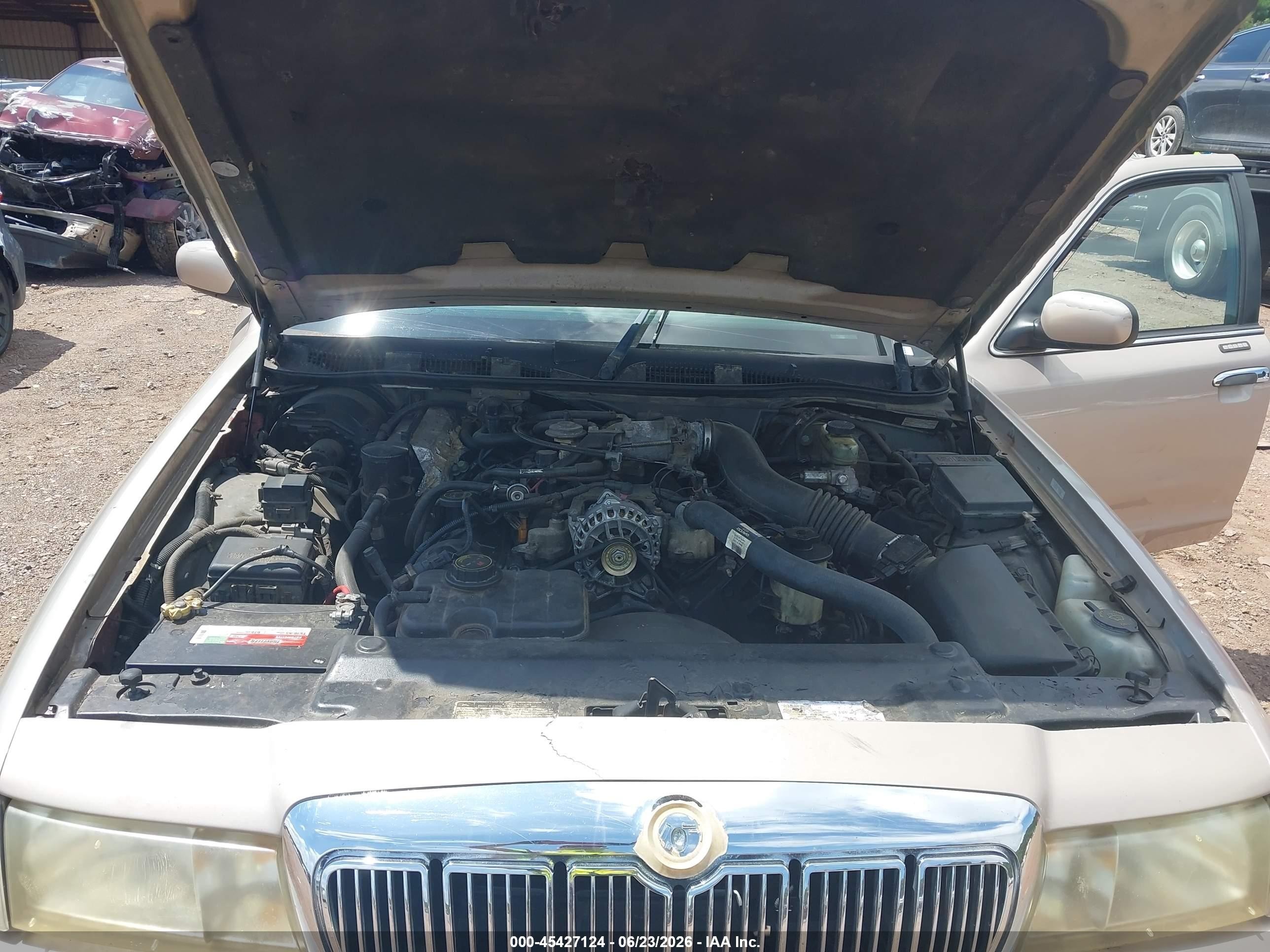 1998 Mercury Grand Marquis   Silver vin: 2MEFM75W1WX631031