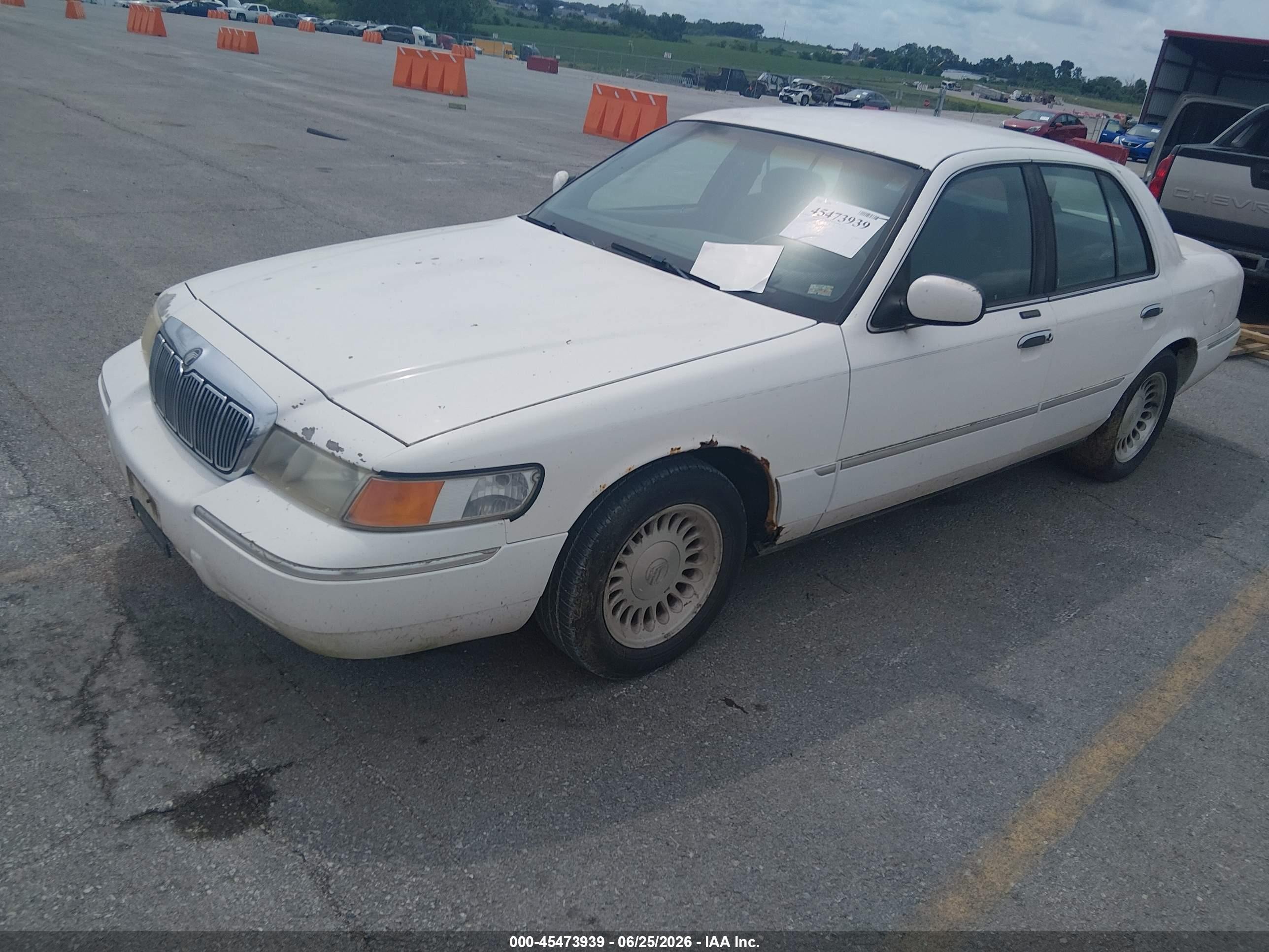 1998 Mercury Grand Marquis   White vin: 2MEFM75W1WX677359