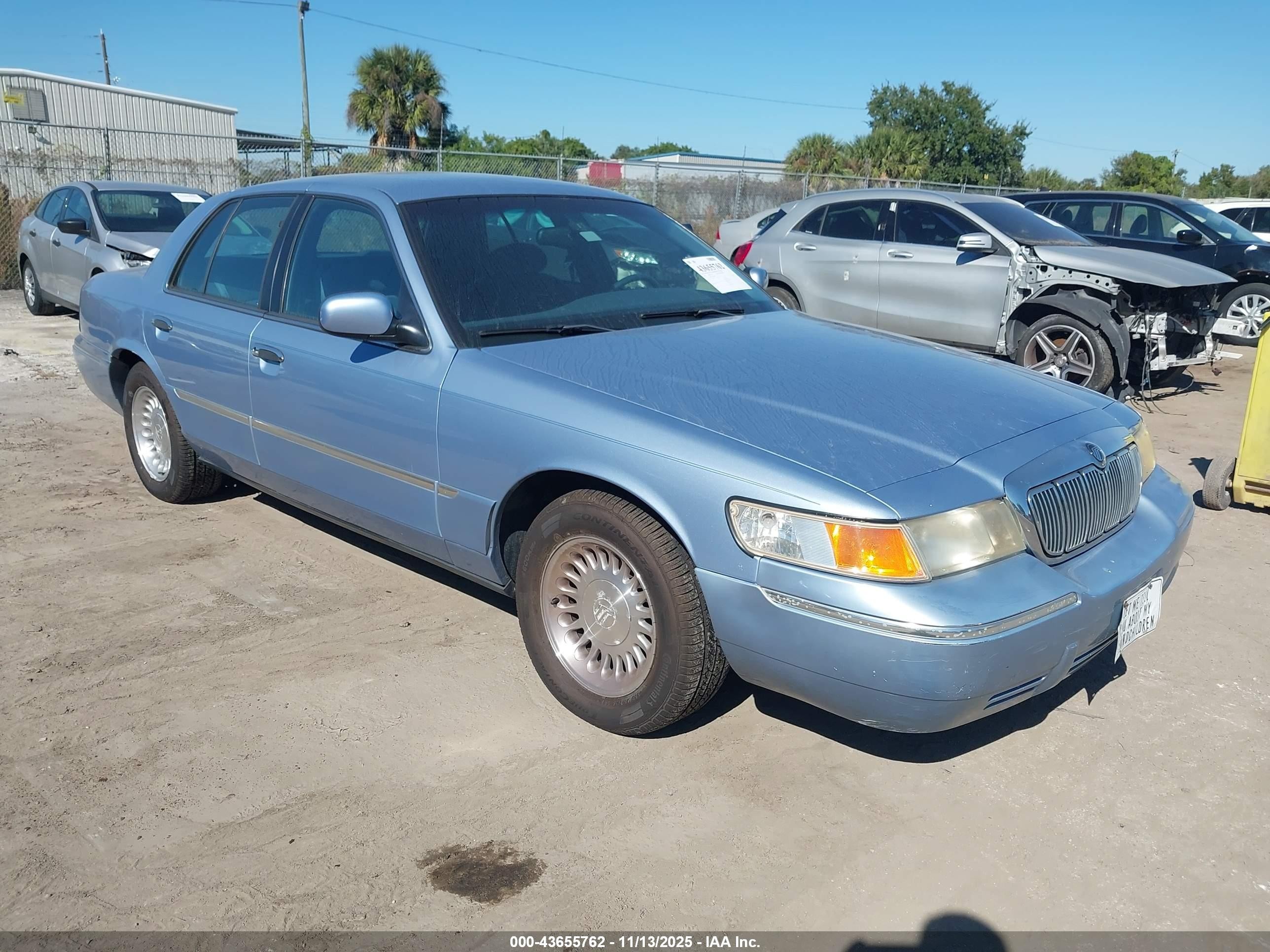 1998 Mercury Grand Marquis   Blue vin: 2MEFM75W1WX682027