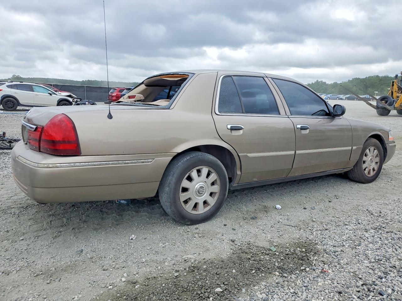 2005 Mercury Grand Marquis Ls Gold vin: 2MEFM75W25X649780