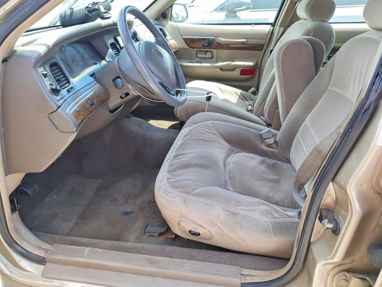 1999 Mercury Grand Marquis Ls Cream vin: 2MEFM75W2XX718647