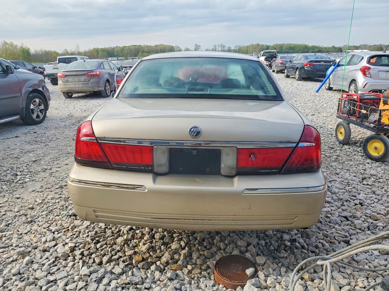 1999 Mercury Grand Marquis Ls Cream vin: 2MEFM75W2XX718647