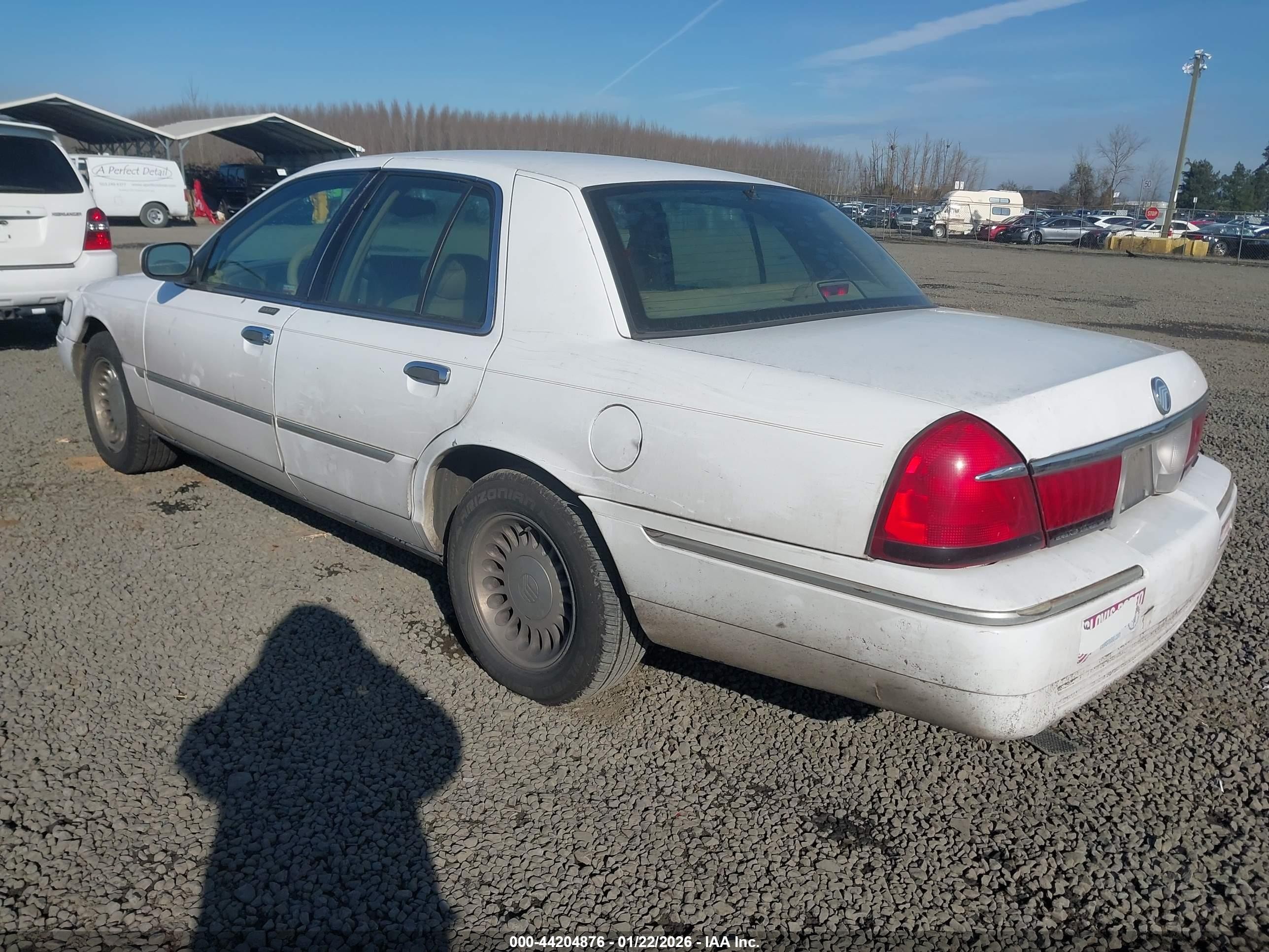 1998 Mercury Grand Marquis   White vin: 2MEFM75W3WX625523