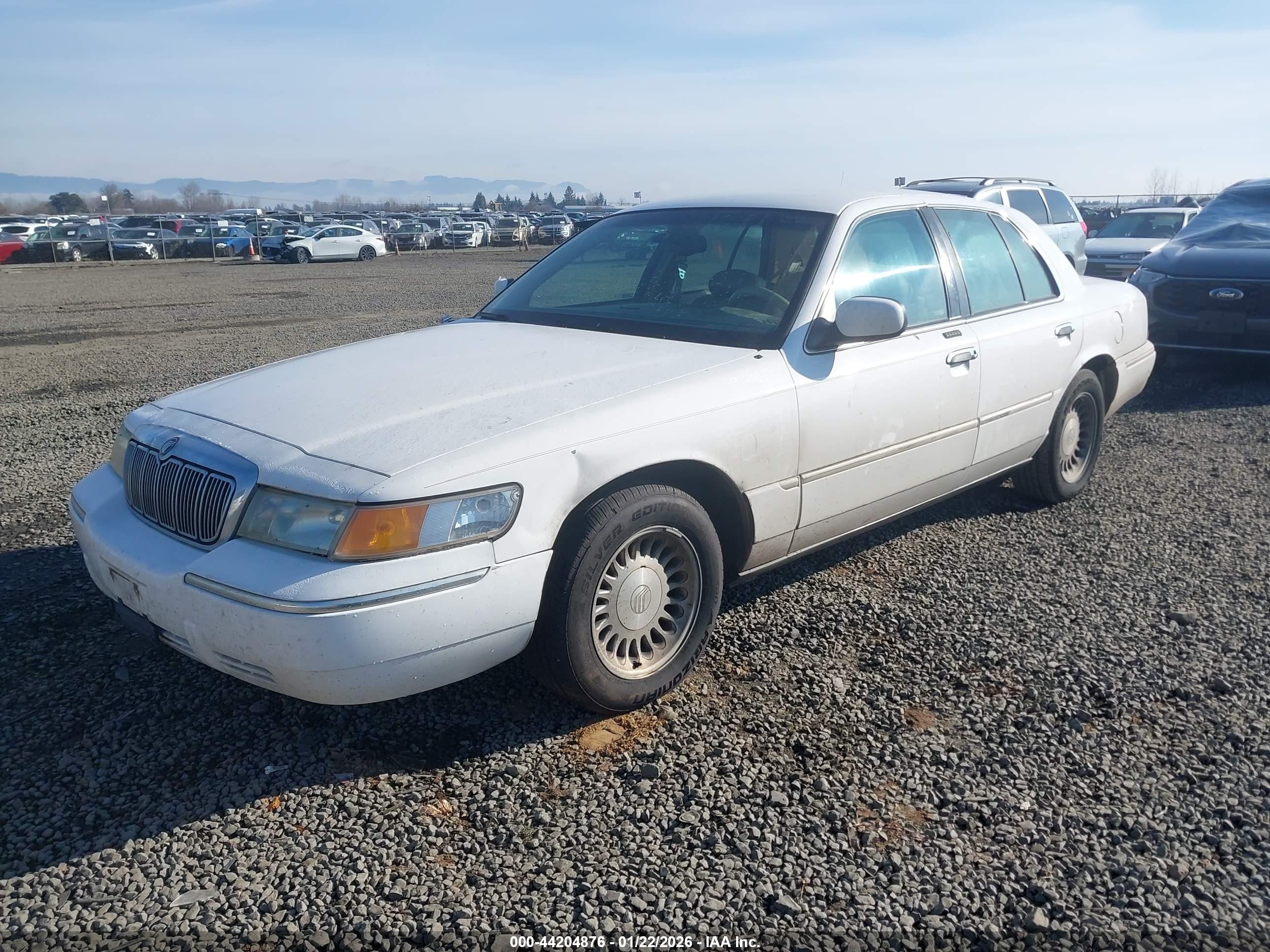 1998 Mercury Grand Marquis   White vin: 2MEFM75W3WX625523