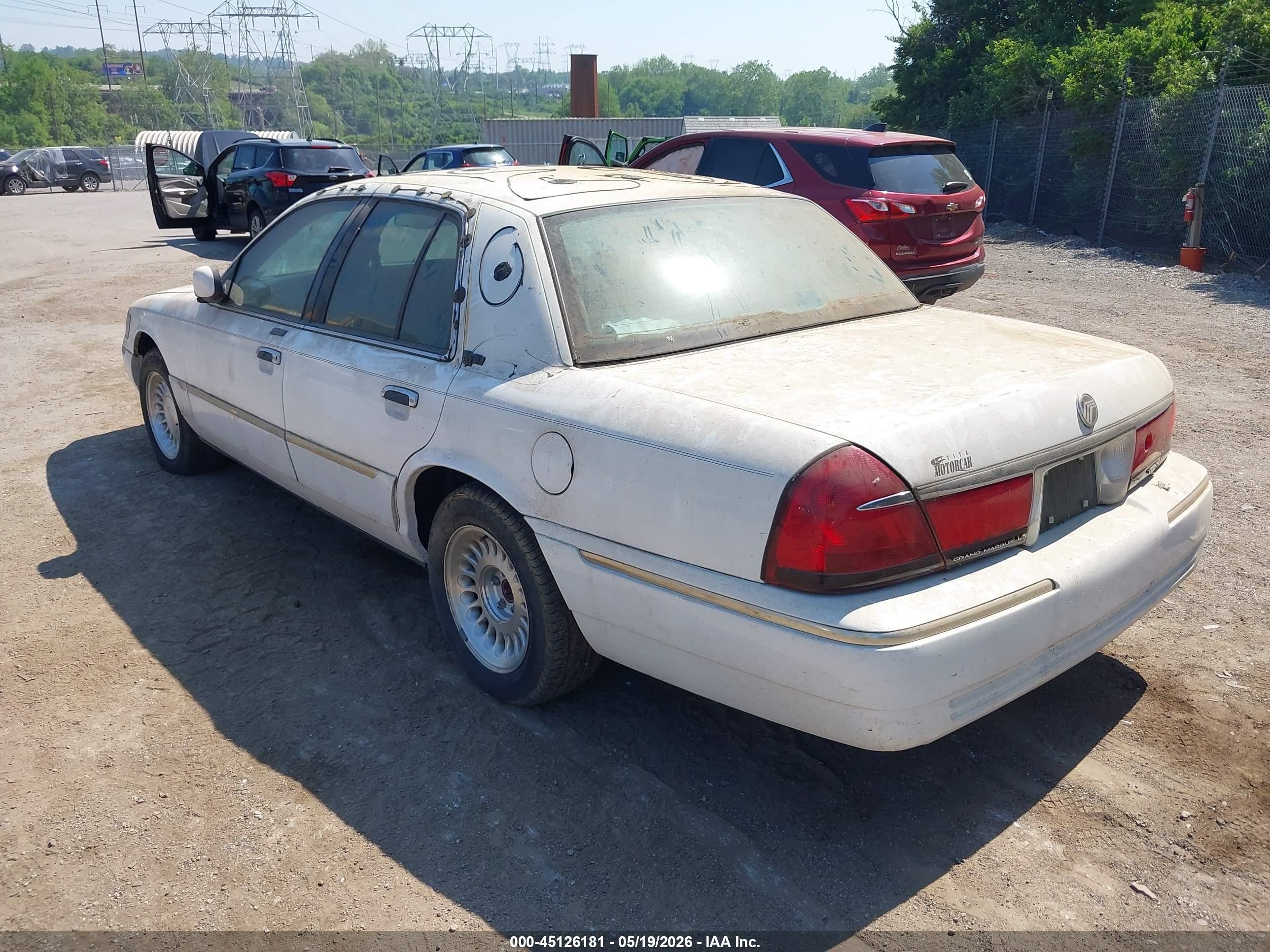 1998 Mercury Grand Marquis   White vin: 2MEFM75W3WX653080