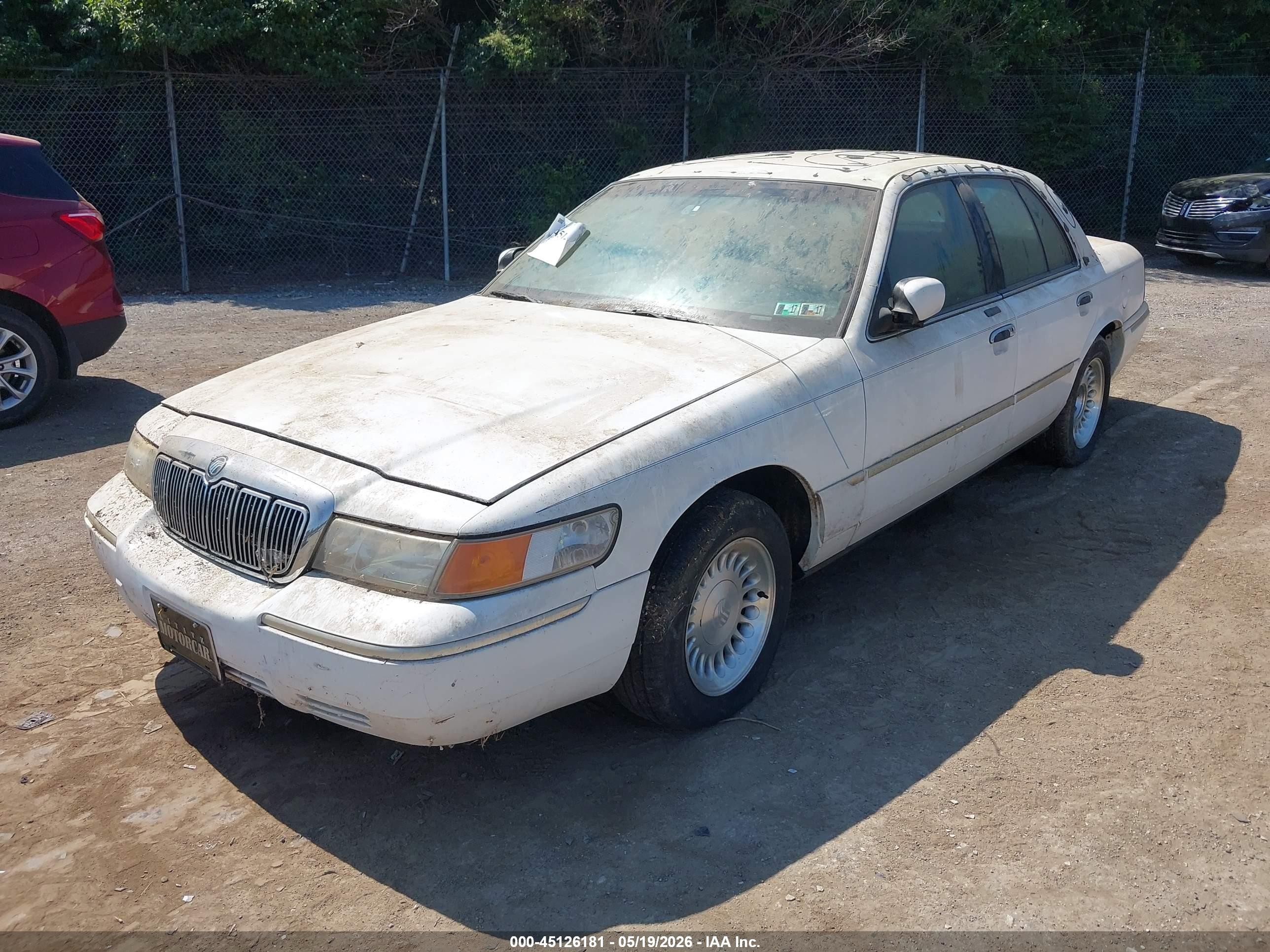 1998 Mercury Grand Marquis   White vin: 2MEFM75W3WX653080