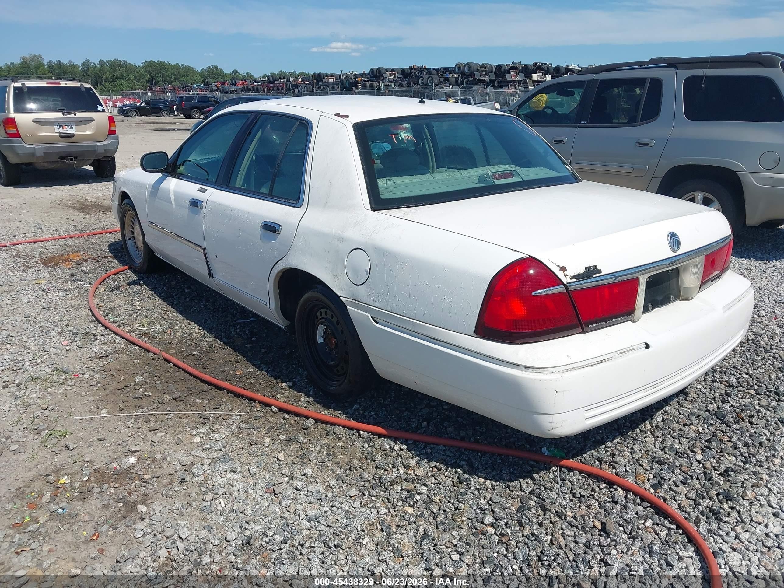 1998 Mercury Grand Marquis   White vin: 2MEFM75W3WX658702