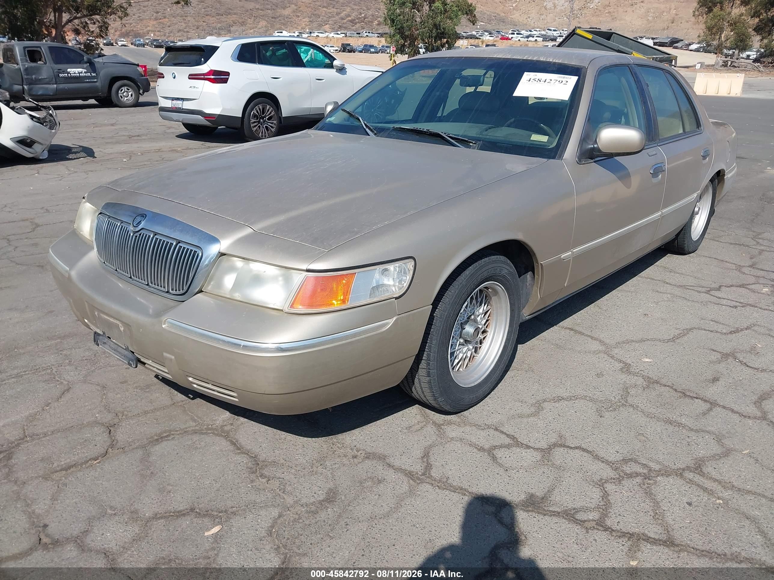 1999 Mercury Grand Marquis Ls Champagne vin: 2MEFM75W3XX634658