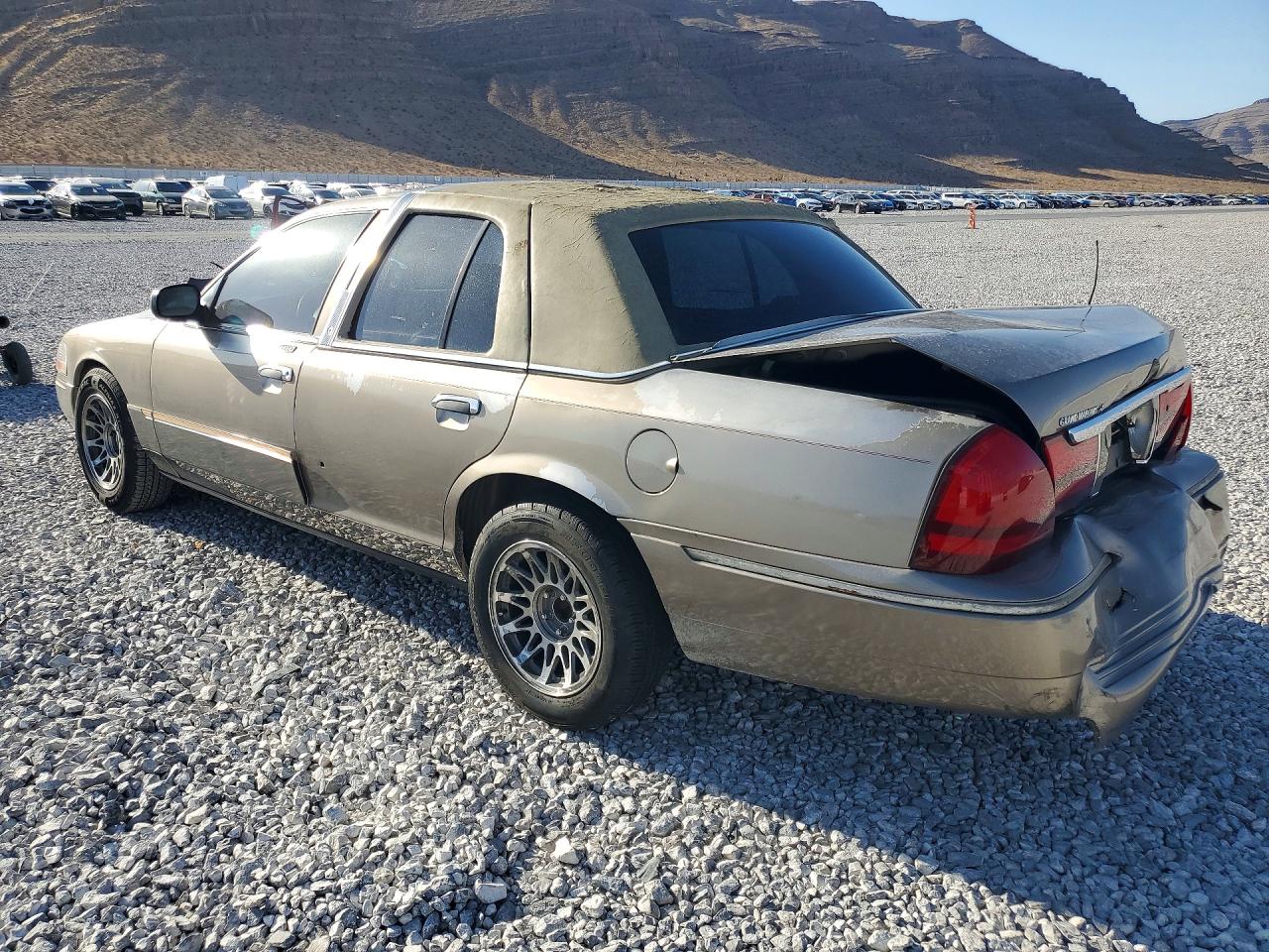 2005 Mercury Grand Marquis Ls Gold vin: 2MEFM75W45X634844