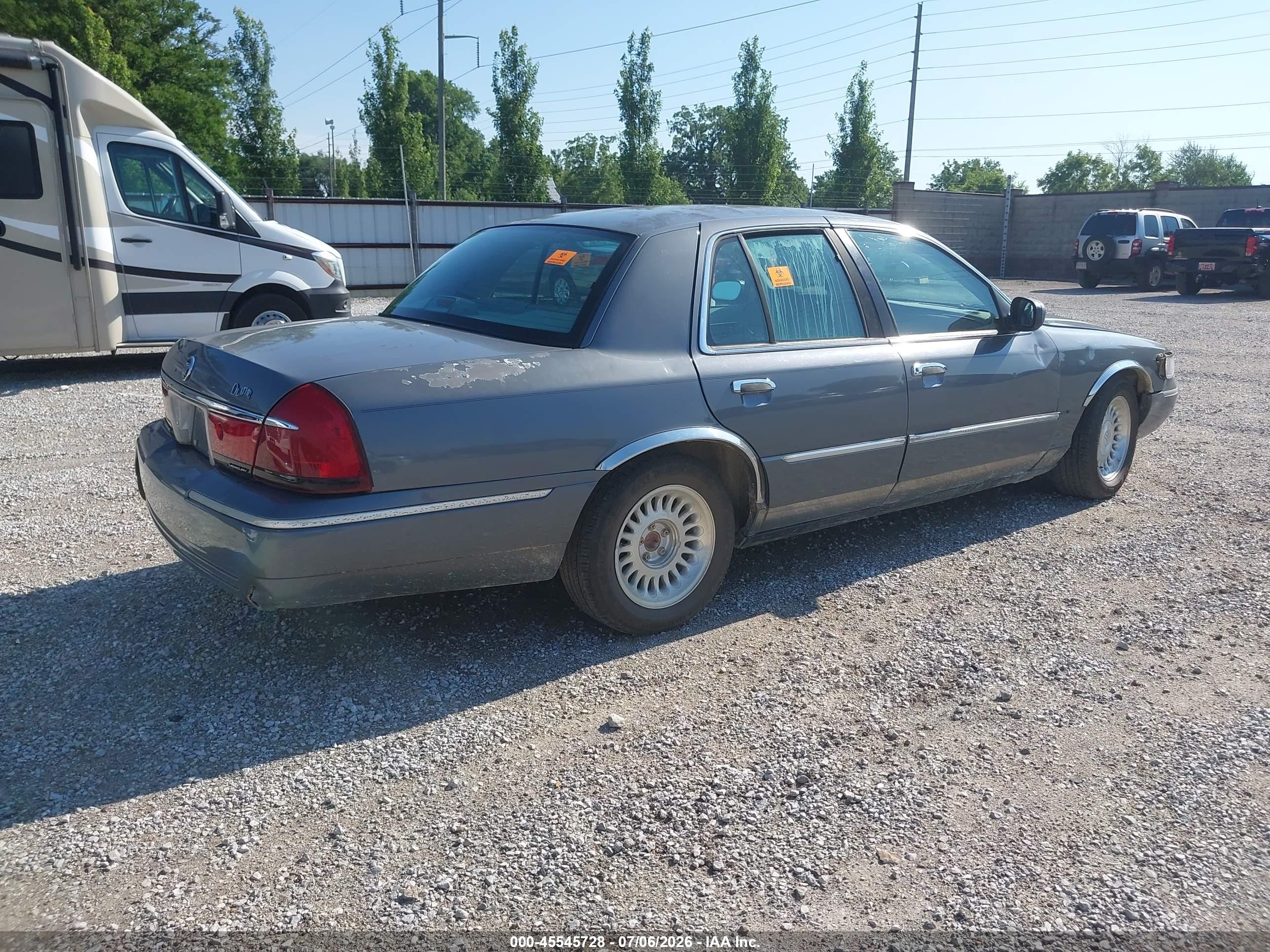 1998 Mercury Grand Marquis   Silver vin: 2MEFM75W4WX659874