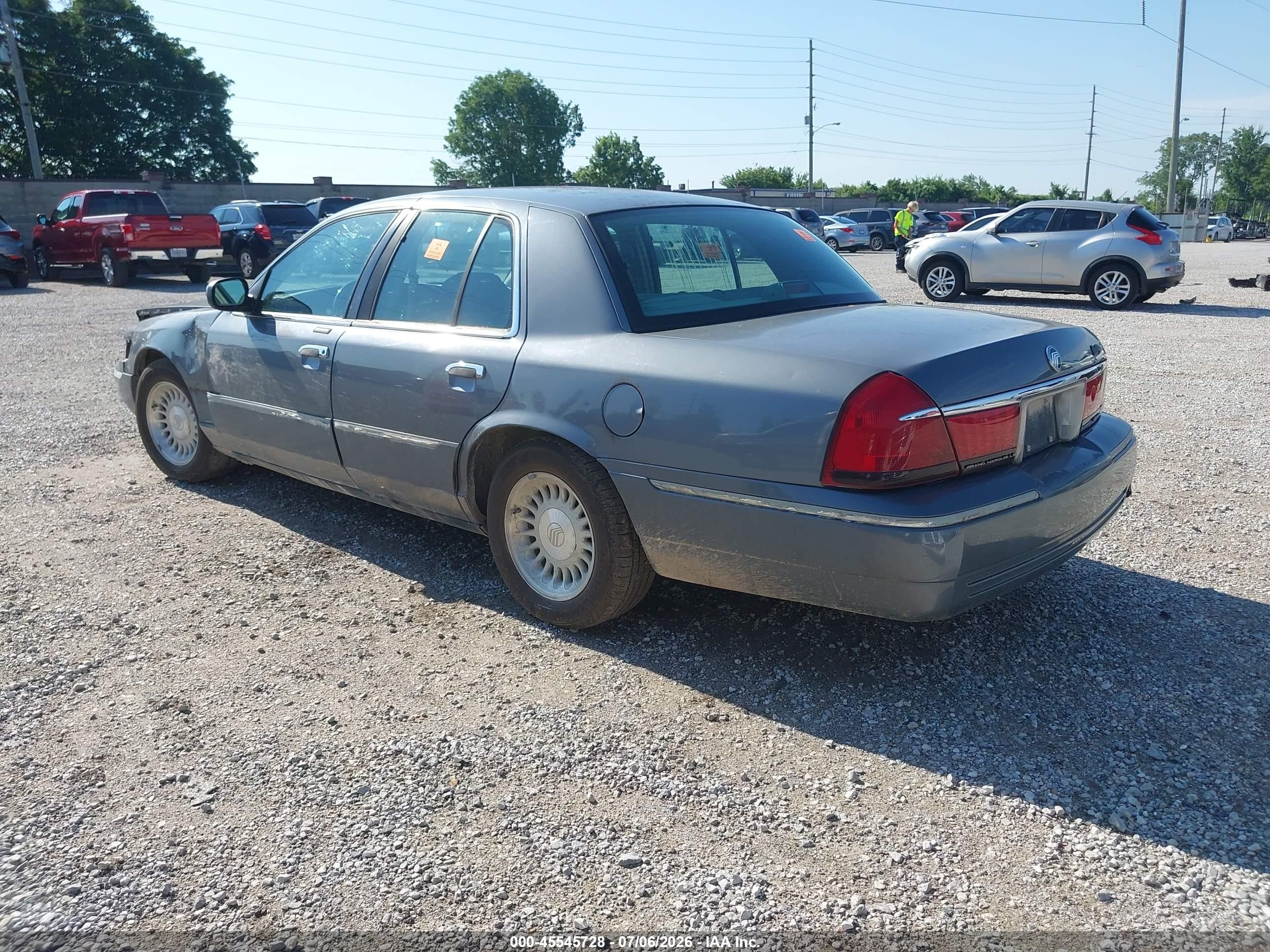 1998 Mercury Grand Marquis   Silver vin: 2MEFM75W4WX659874